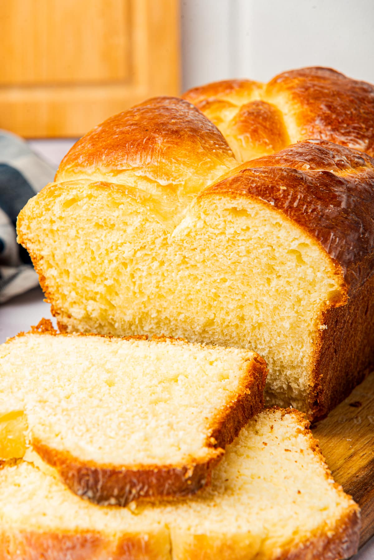 Brioche bread on wooden board sliced