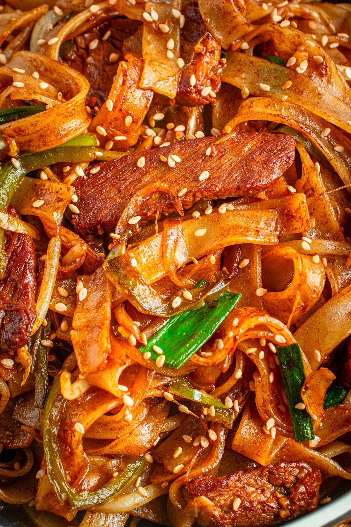 up close image of Beef Chow Ho Fun in skillet