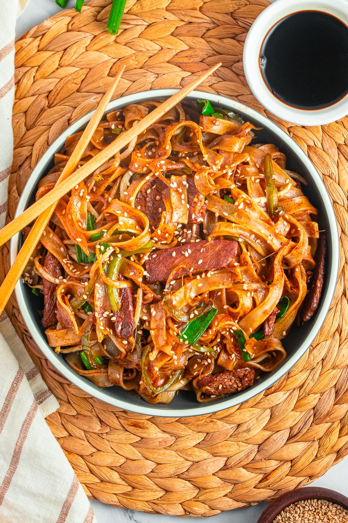 overhead image of Beef Chow Ho Fun in a large bowl