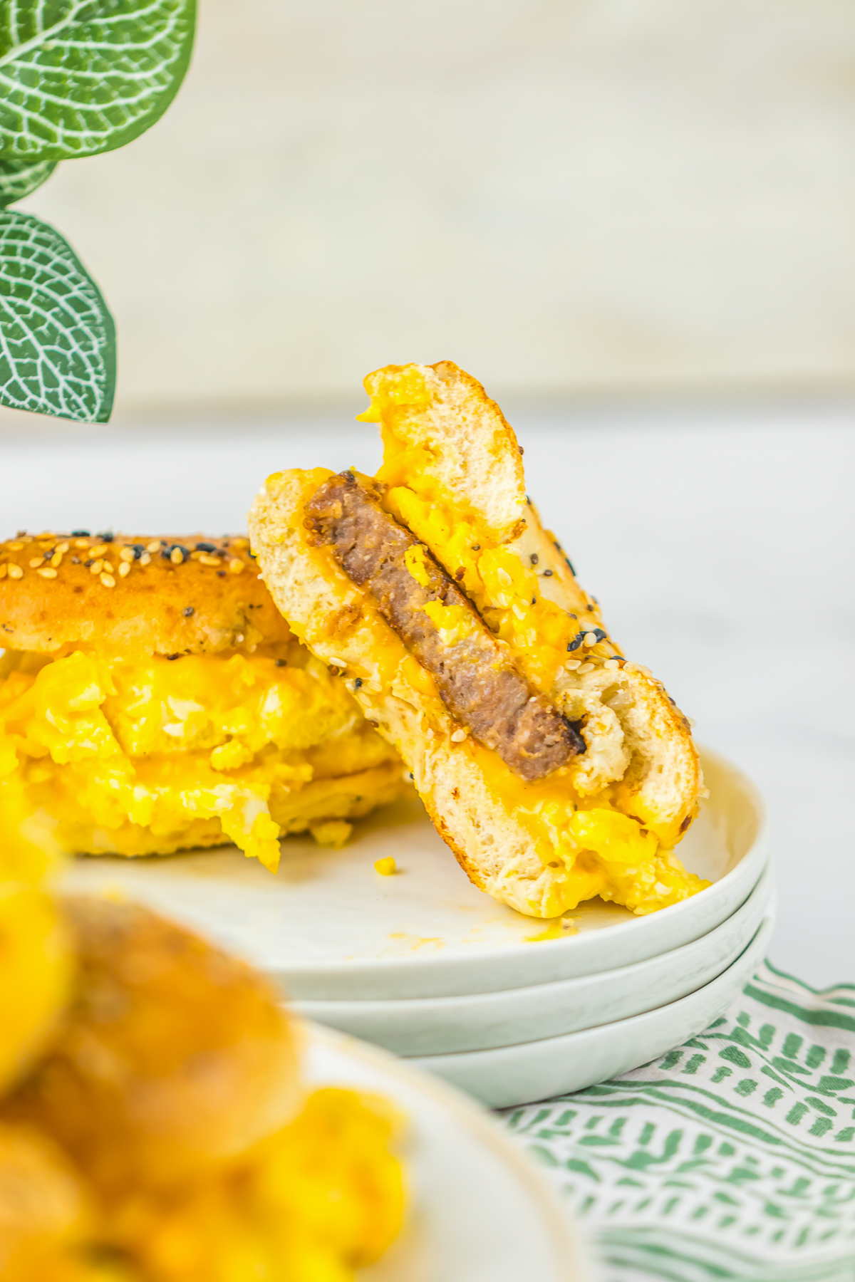 Breakfast Sliders cut in half on a small plate