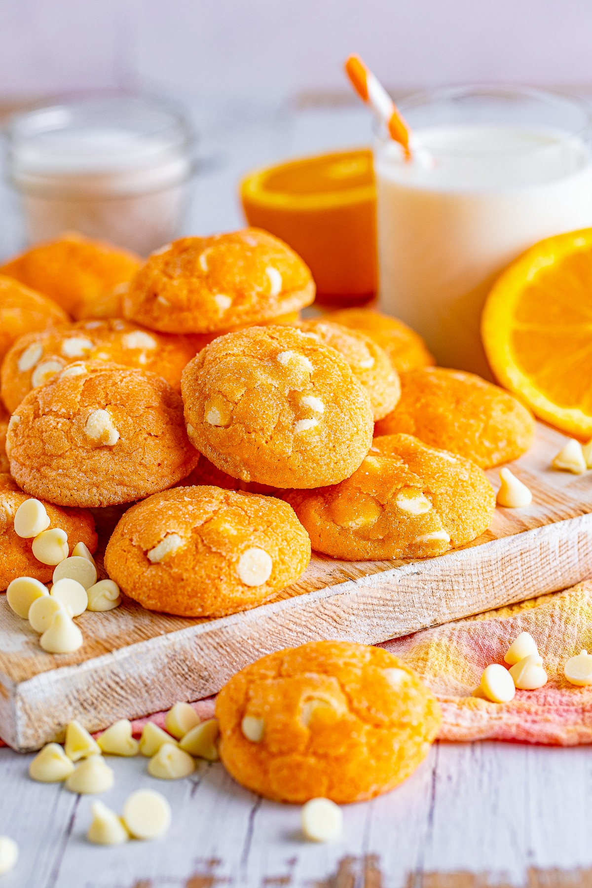 a bunch of Orange Creamsicle Cookies on a wooden server