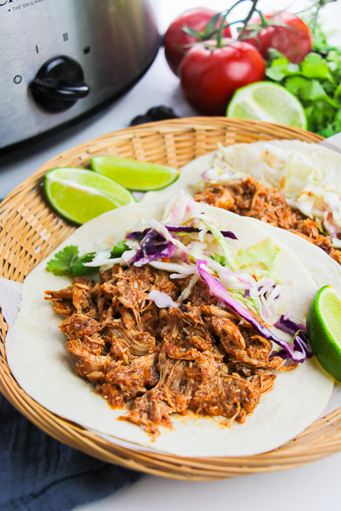 45 degree angle of Crockpot Pulled Chicken Tacos in basket