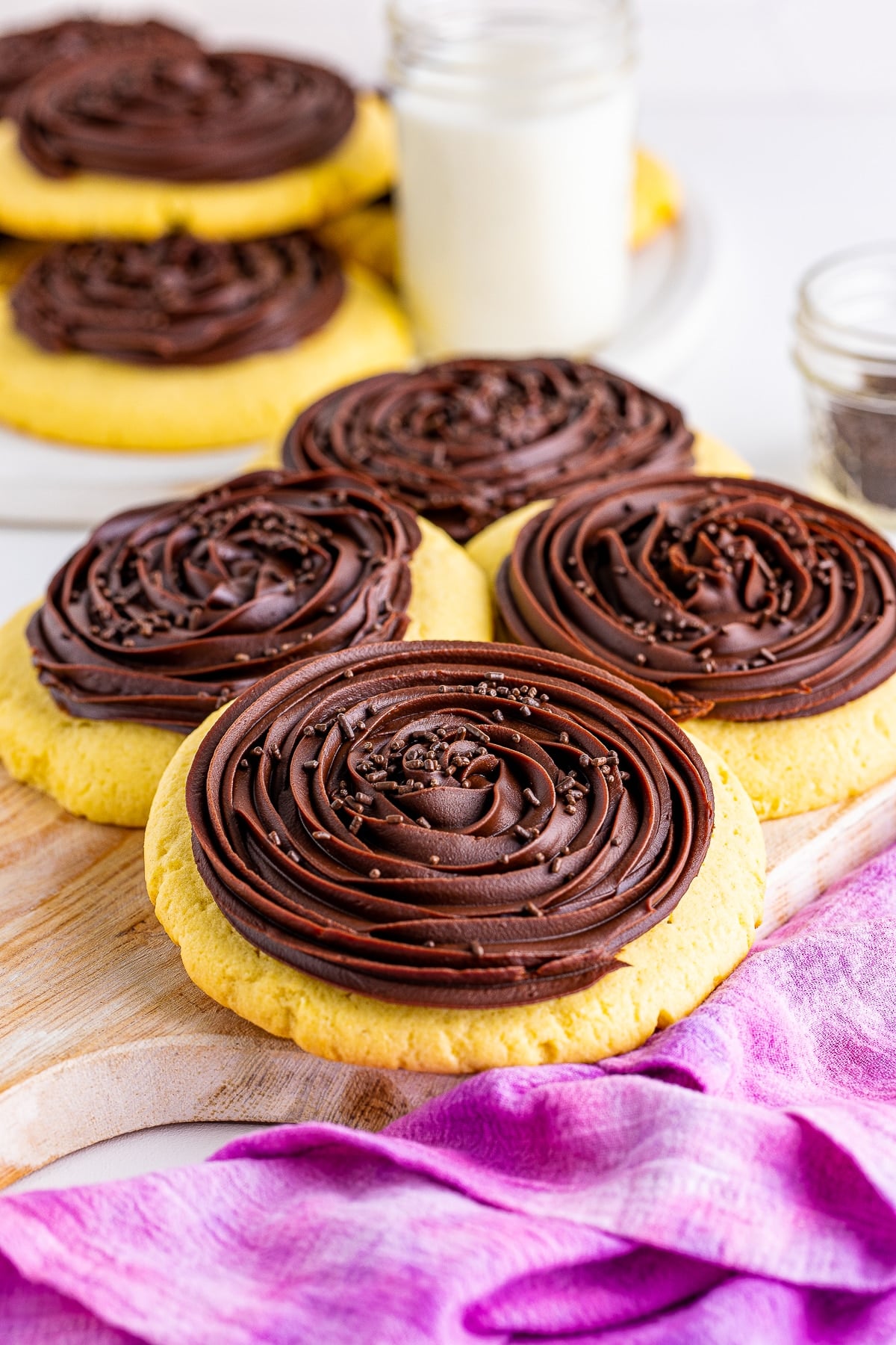 4 Chocolate Cupcake Cookies on a wooden board