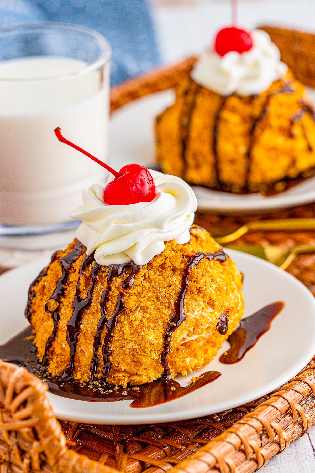 fried ice cream served on white plates on a tray