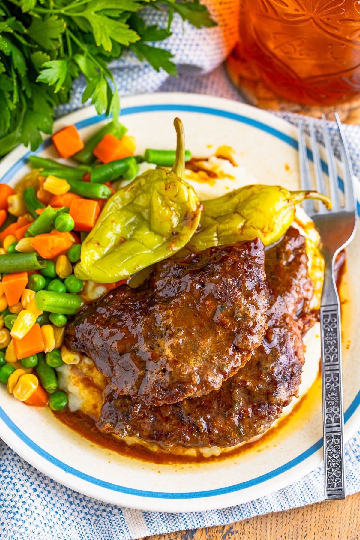 overhead image of Beef Cubed Steaks on top of mashed potatoes
