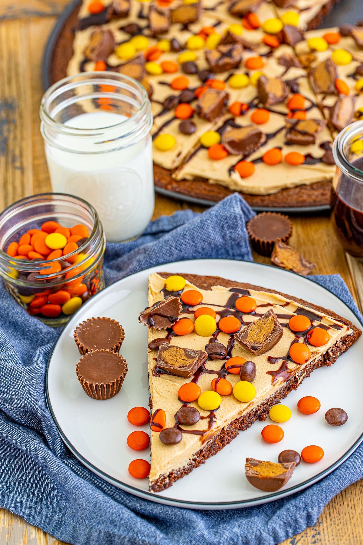 farther away image of a slice of Dessert Pizza on a white plate