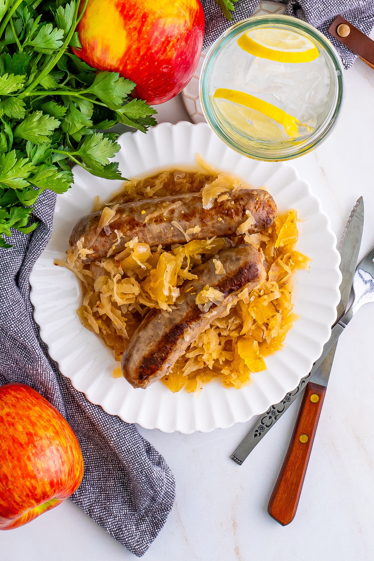 overhead image of Brats and Sauerkraut served on plate