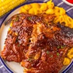 Overhead image of slow cooker Coca-Cola ribs glazed with bbq sauce.