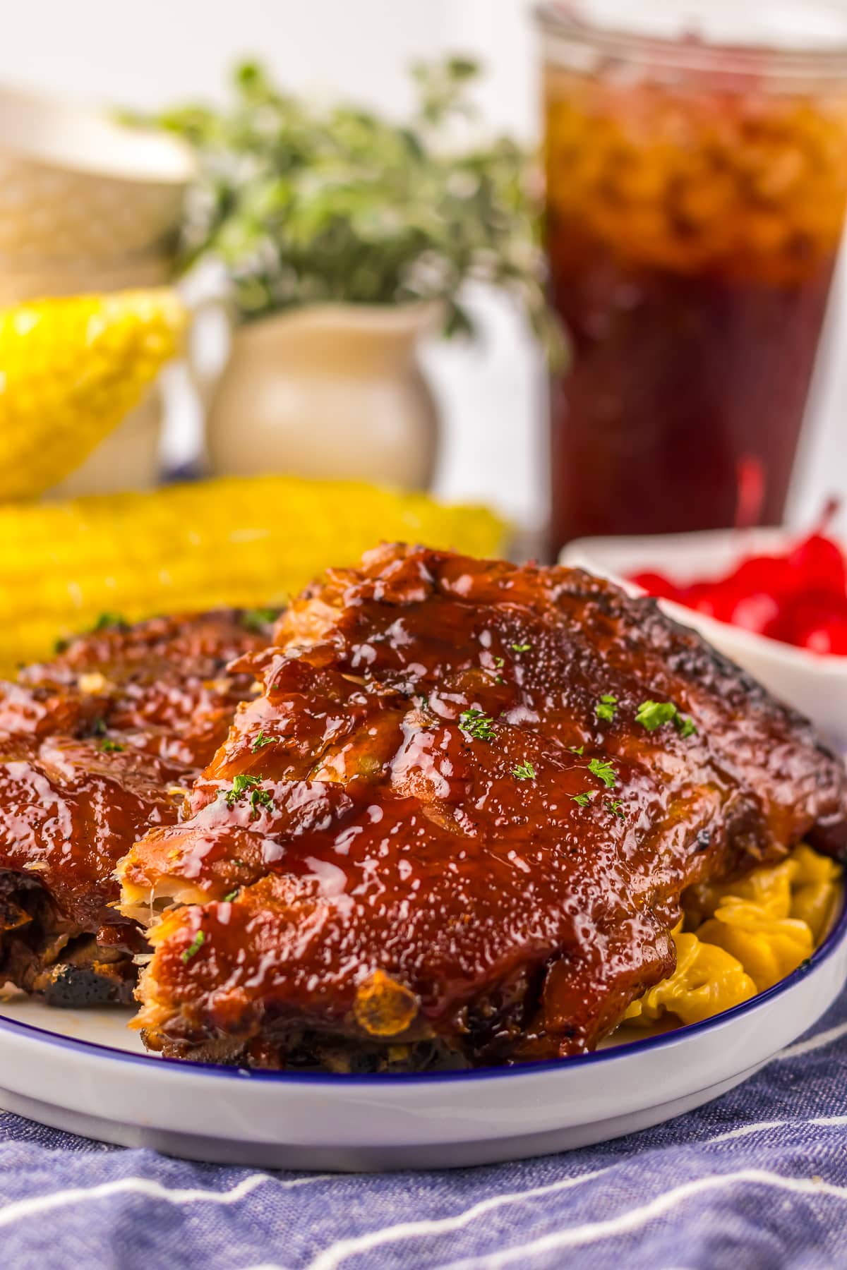 Slow Cooker Barbecue Ribs with Coke on a plate with mac and cheese
