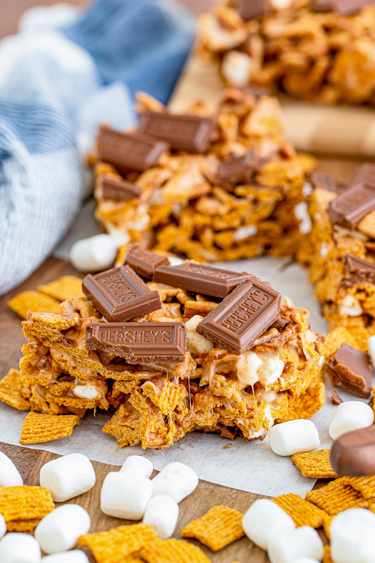 Cereal Treats with a bite taken out on parchment paper