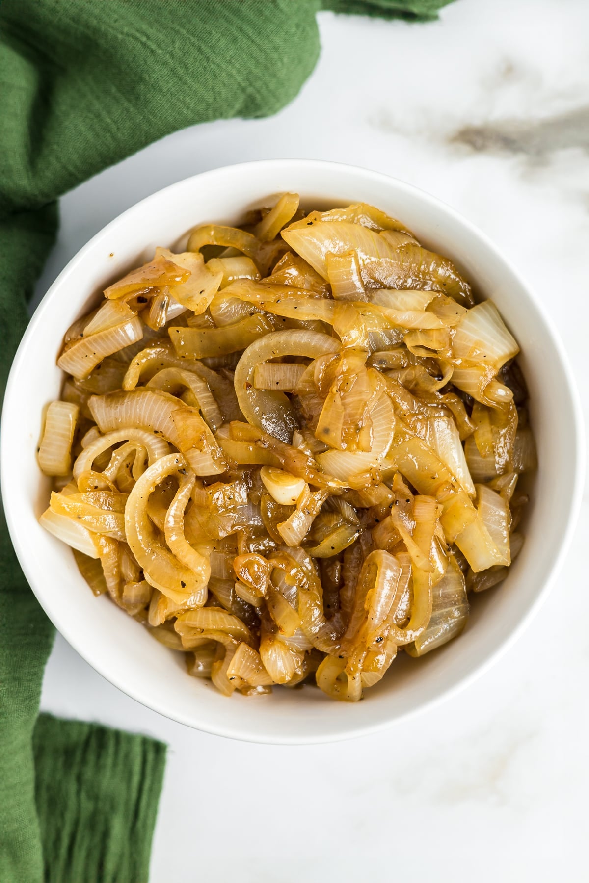 overhead image of Coca Cola Onions served in a white bowl