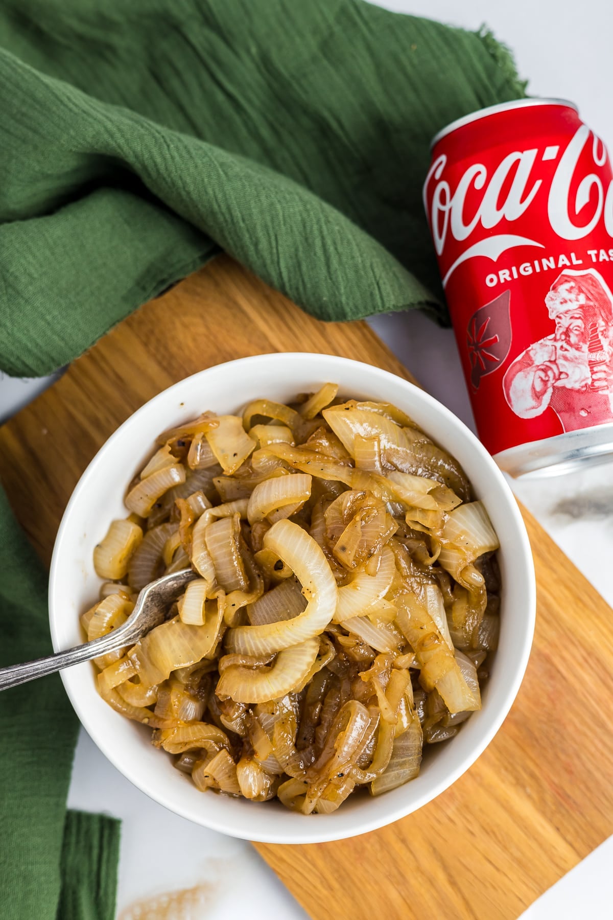 Coca Cola Onions in a small white bowl, overhead image