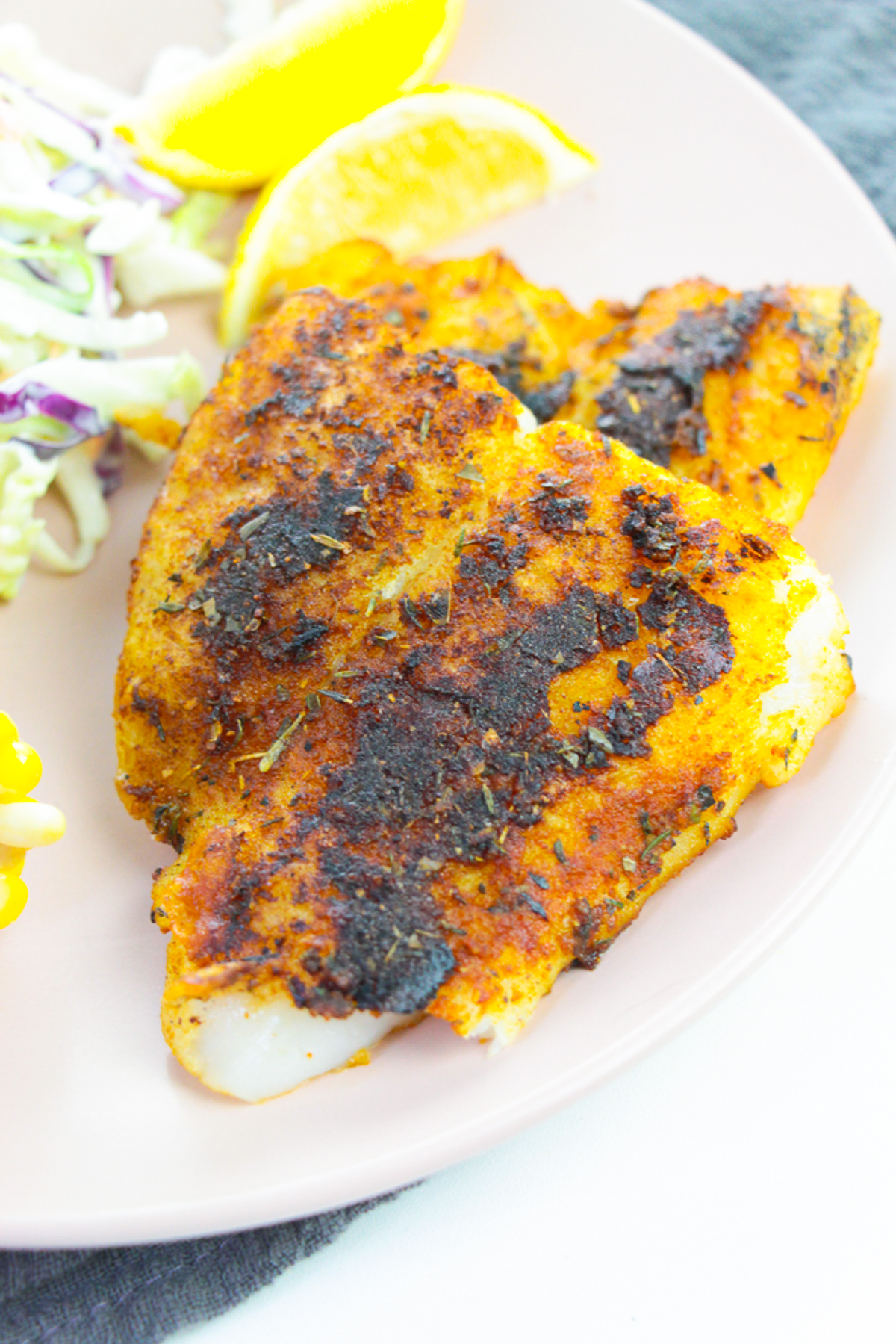 up close overhead image of Blackened Catfish on serving plate