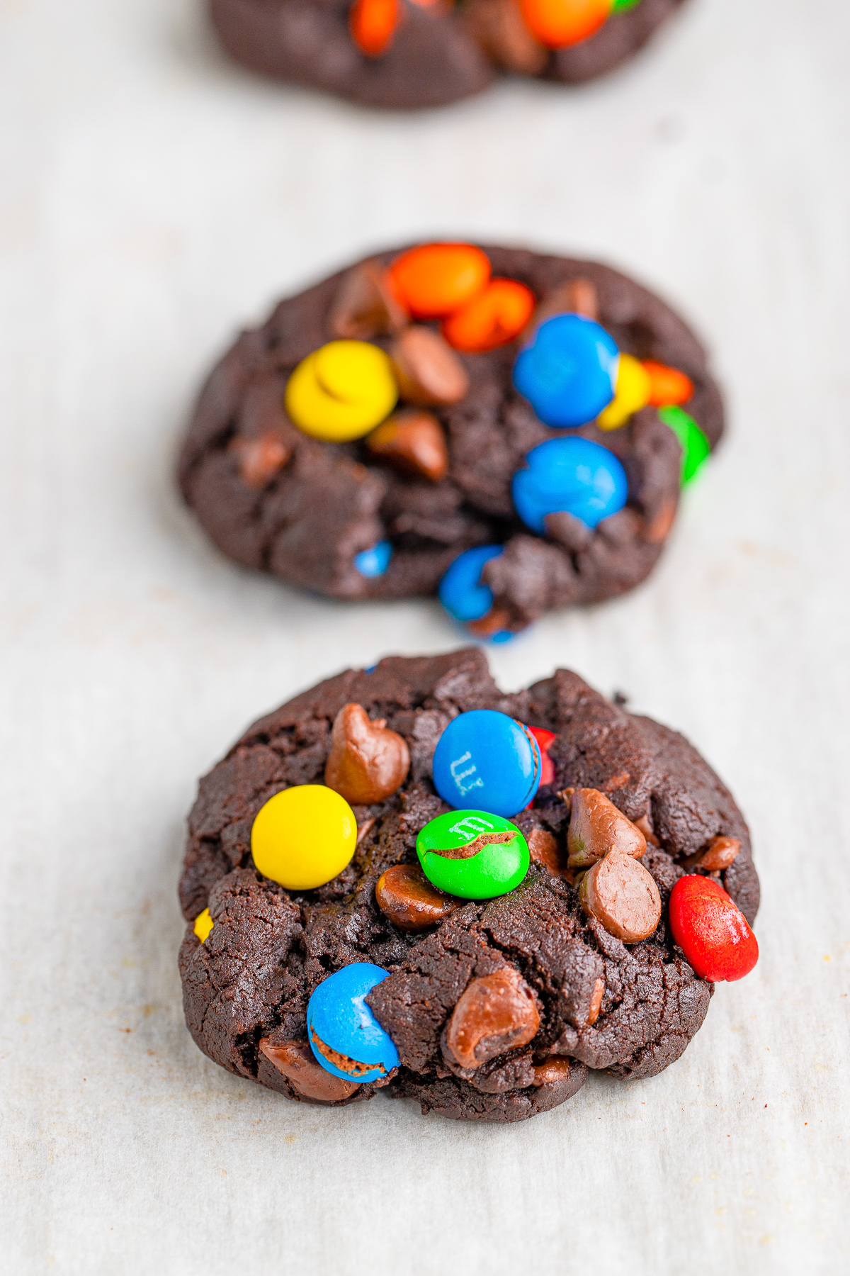 Chocolate Chip M&M Cookies on parchment paper