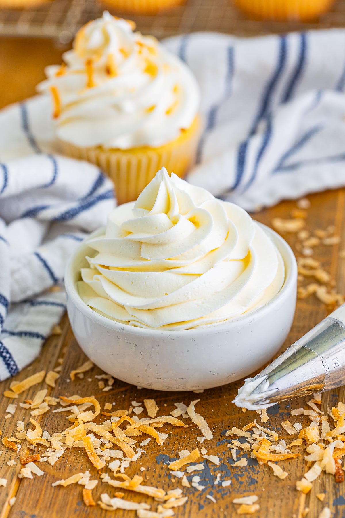 Coconut Frosting piped into a small white bowl