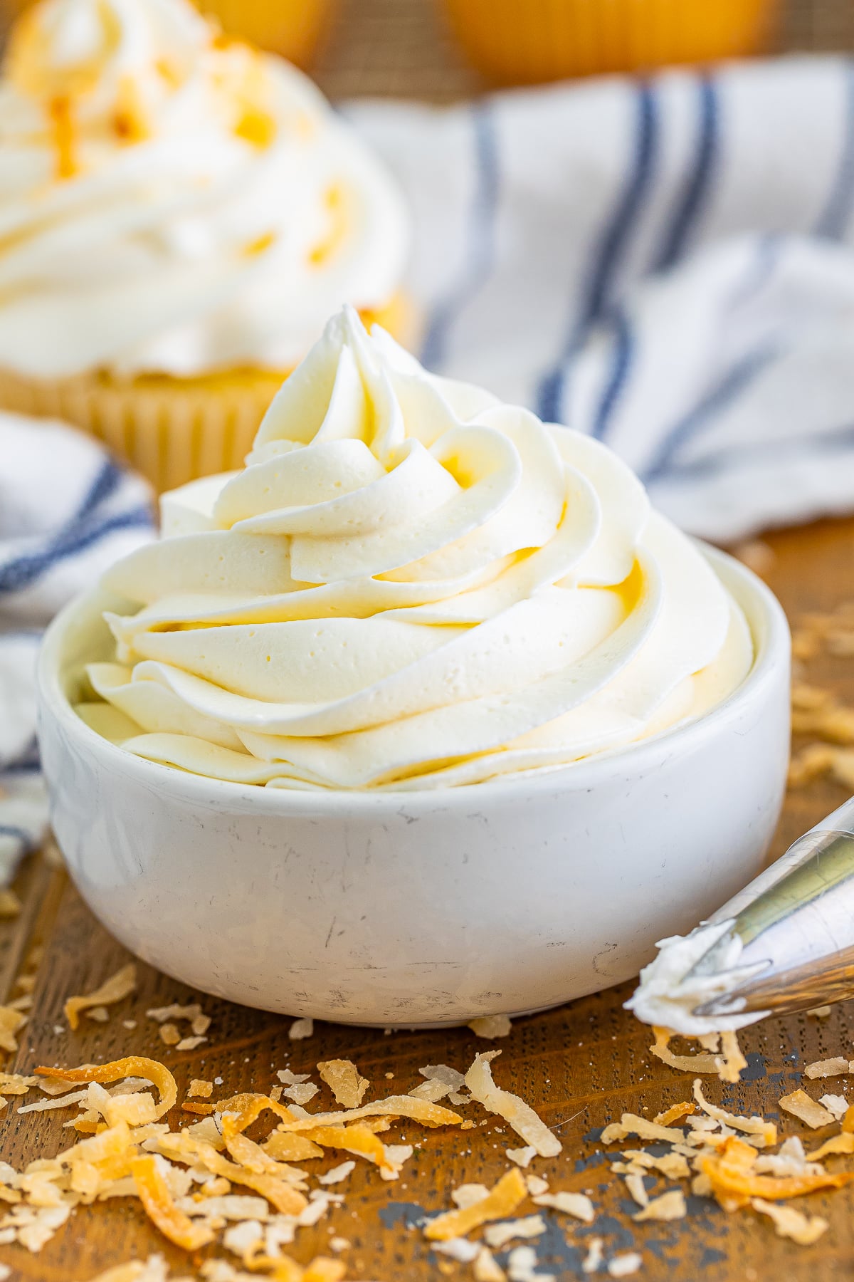 Coconut Frosting piped into a small bowl