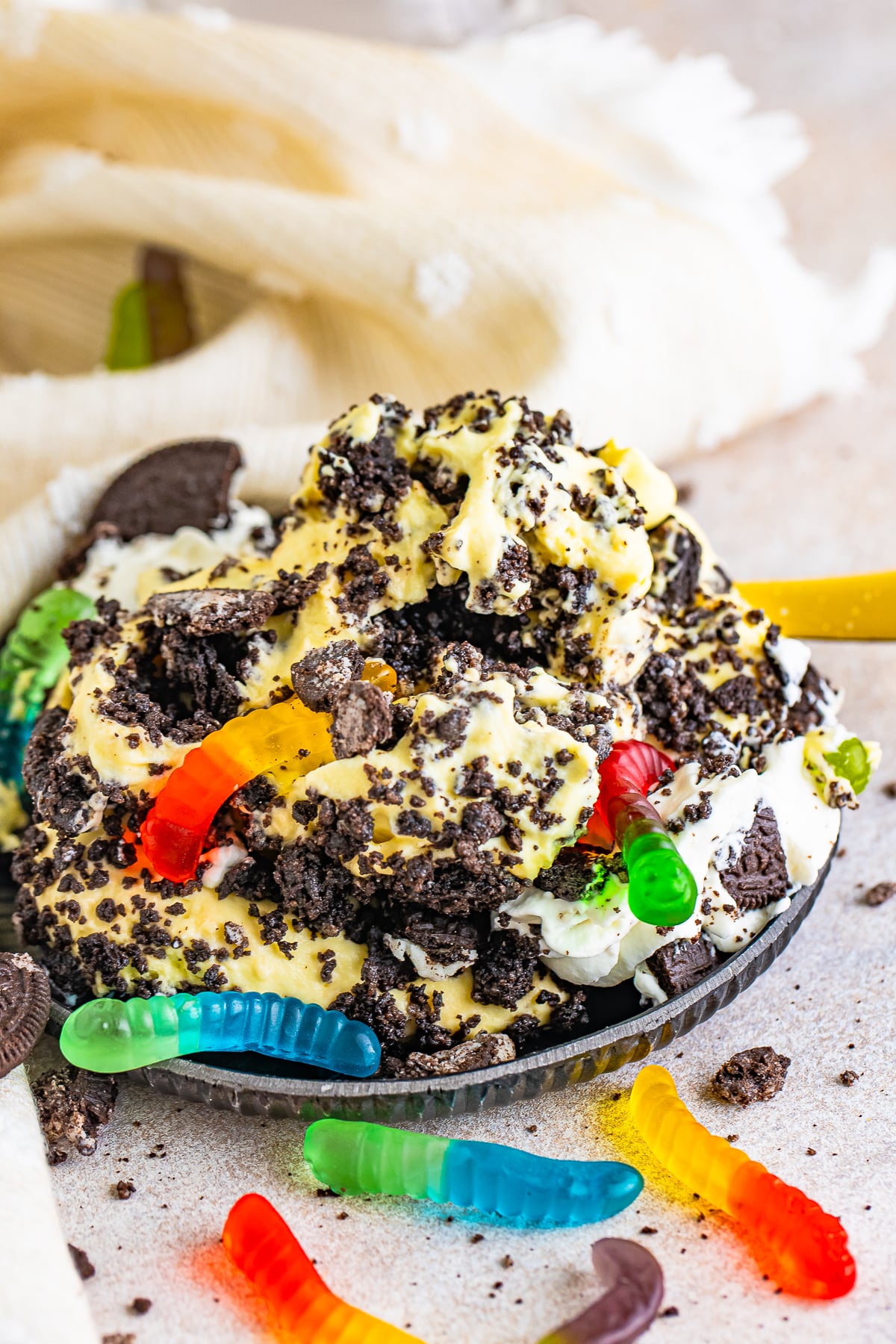 a portion of Dirt Cake Recipe on a grey plate