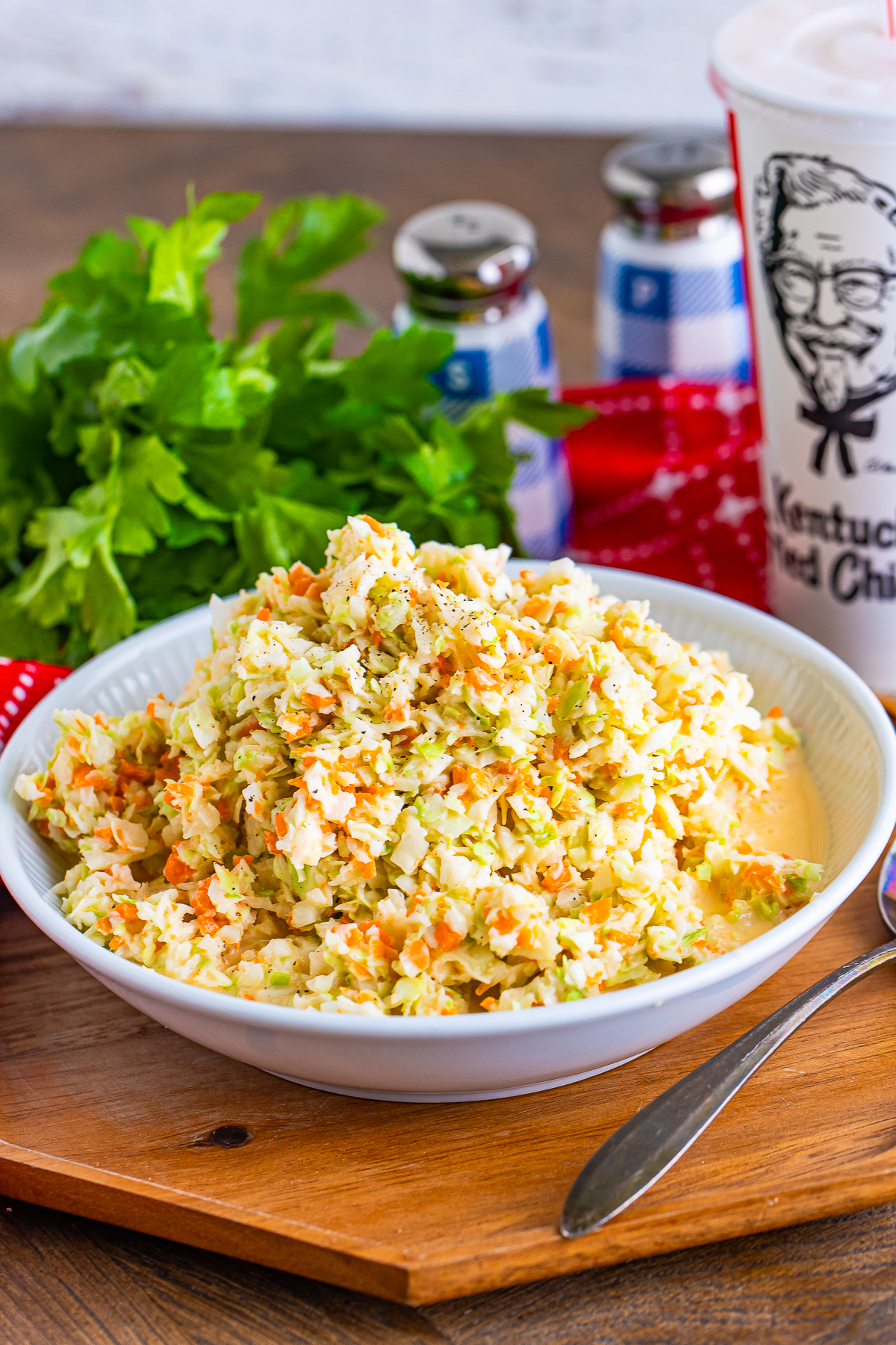 Kentucky Fried Chicken Coleslaw Recipe served on a wooden board