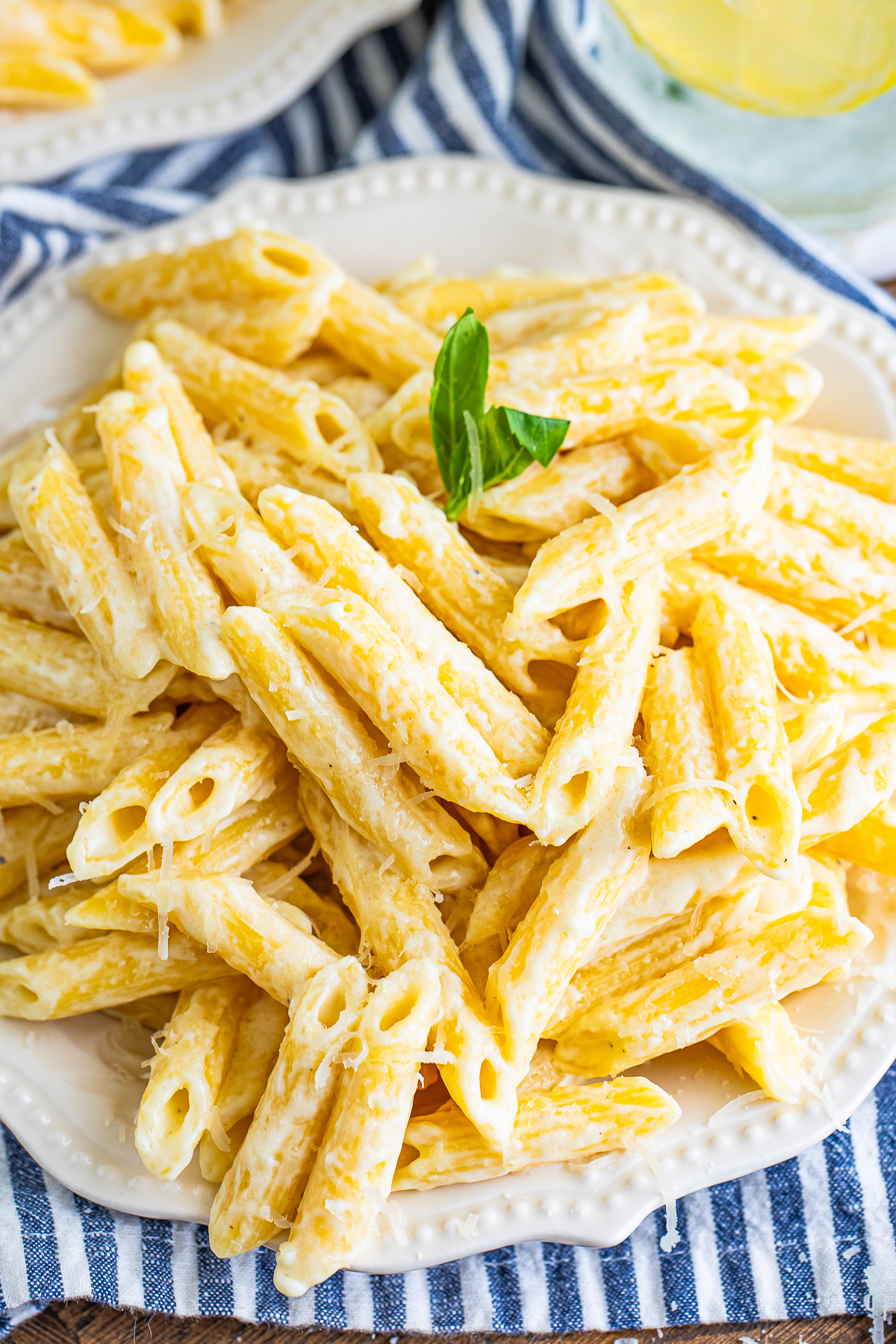 up close overhead image of Alfredo Sauce with Penne Pasta served on a plate