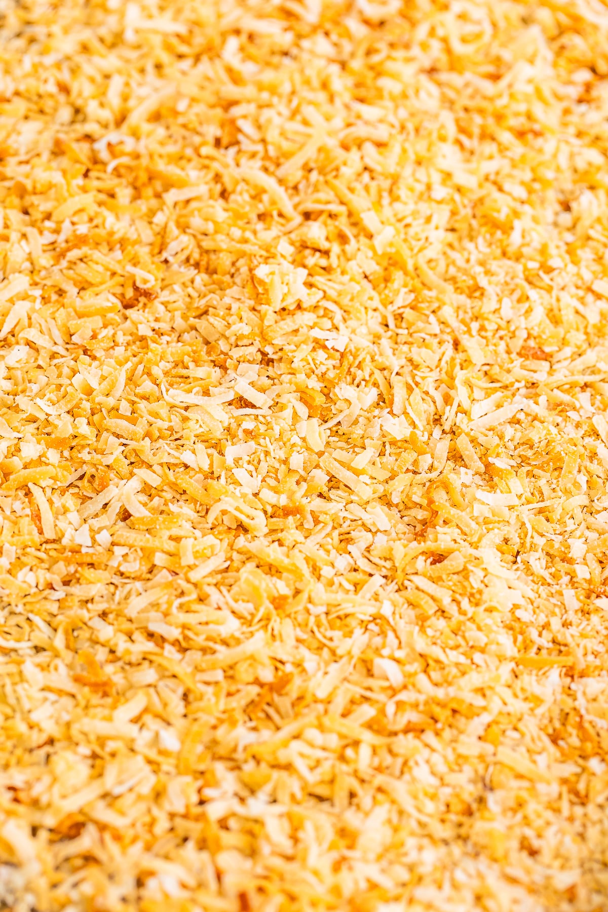 up close image of a lot of toasted coconut