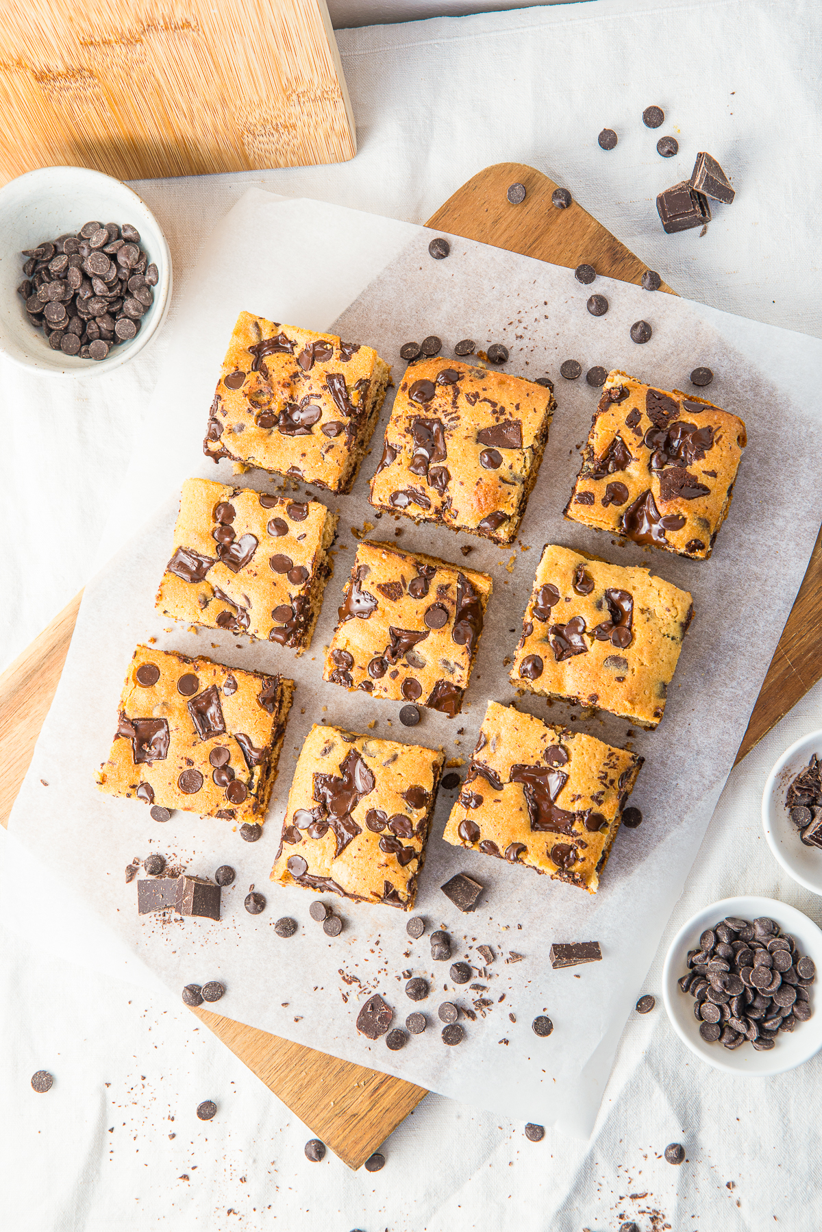 finished Chocolate Chip Cookie Bars cut into bars on a cutting board