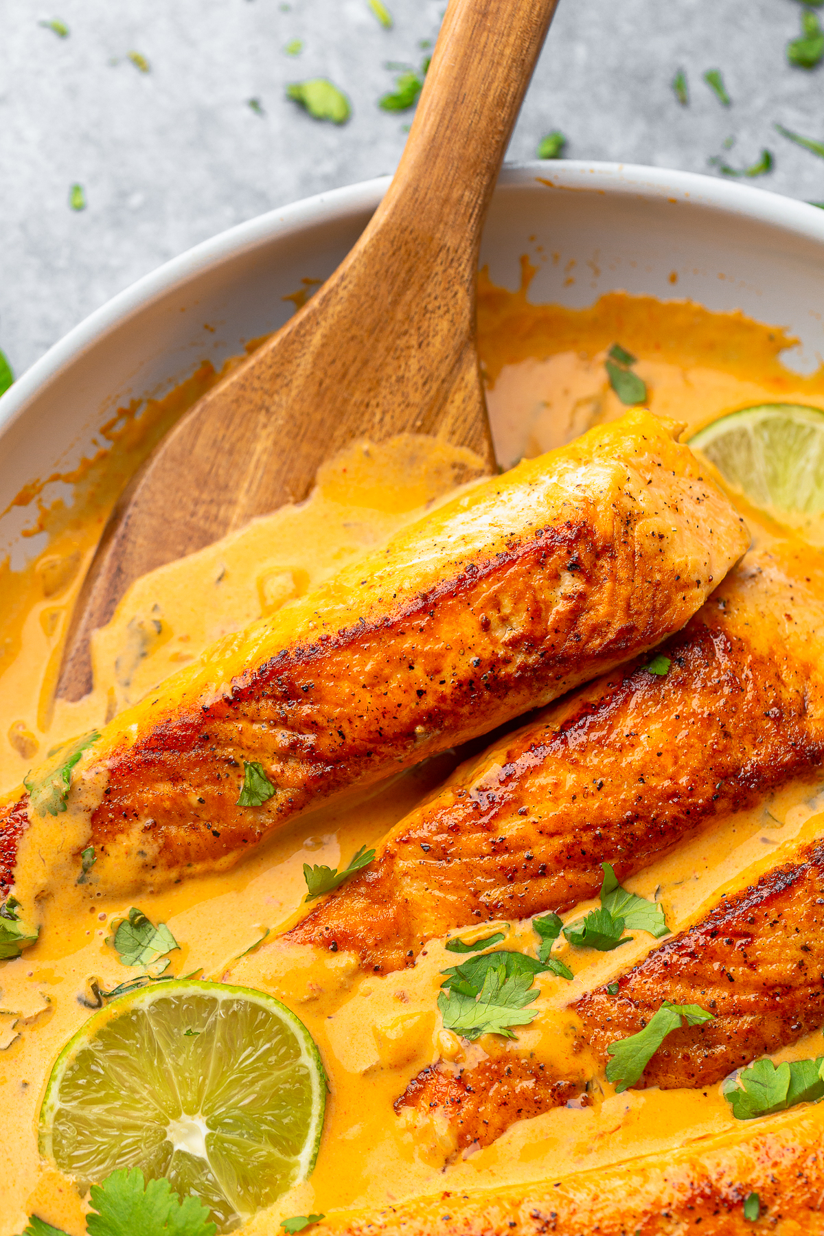 up close image of Curry with Salmon in skillet