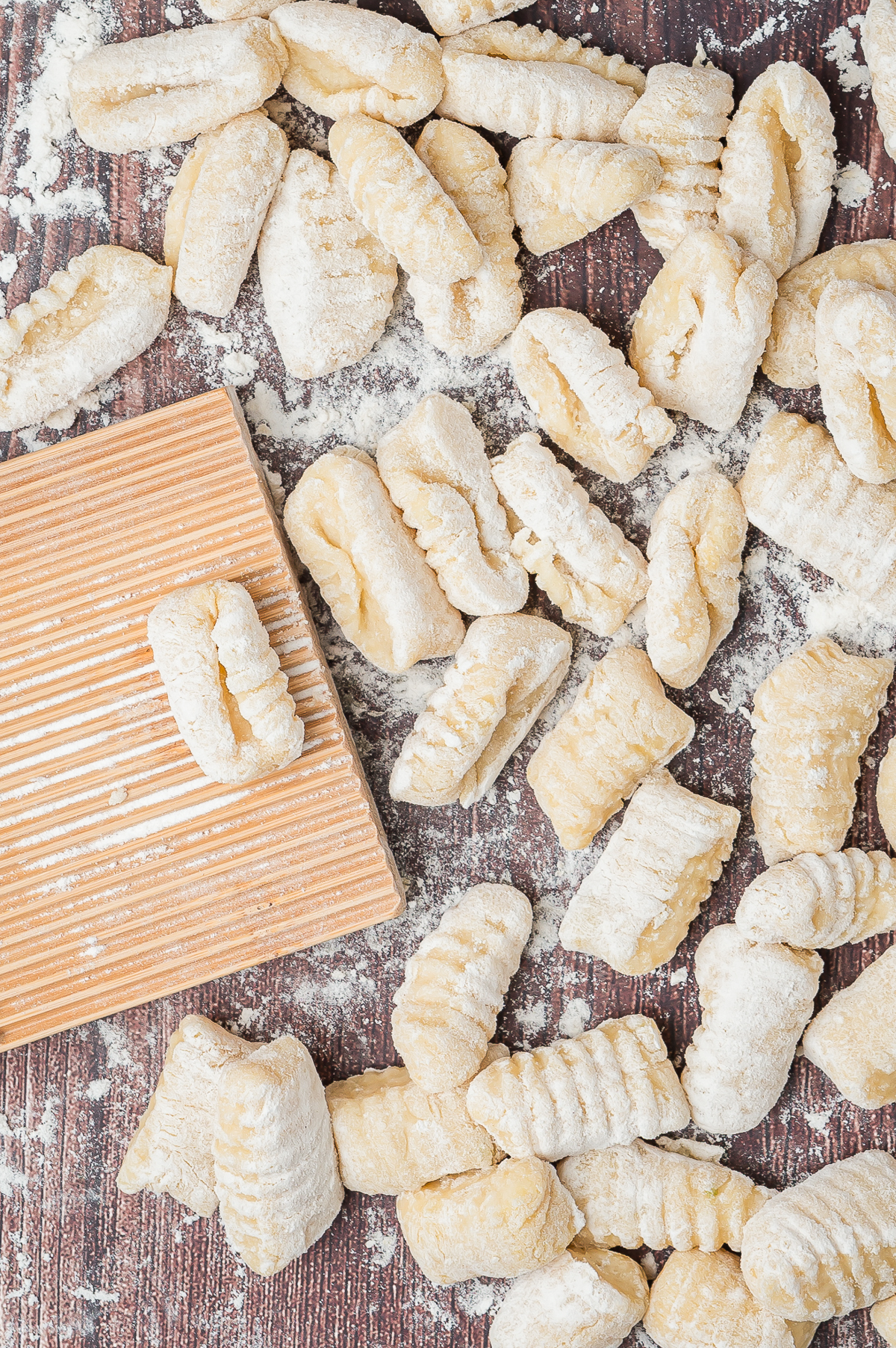 overhead image of Gnocchi formed with board