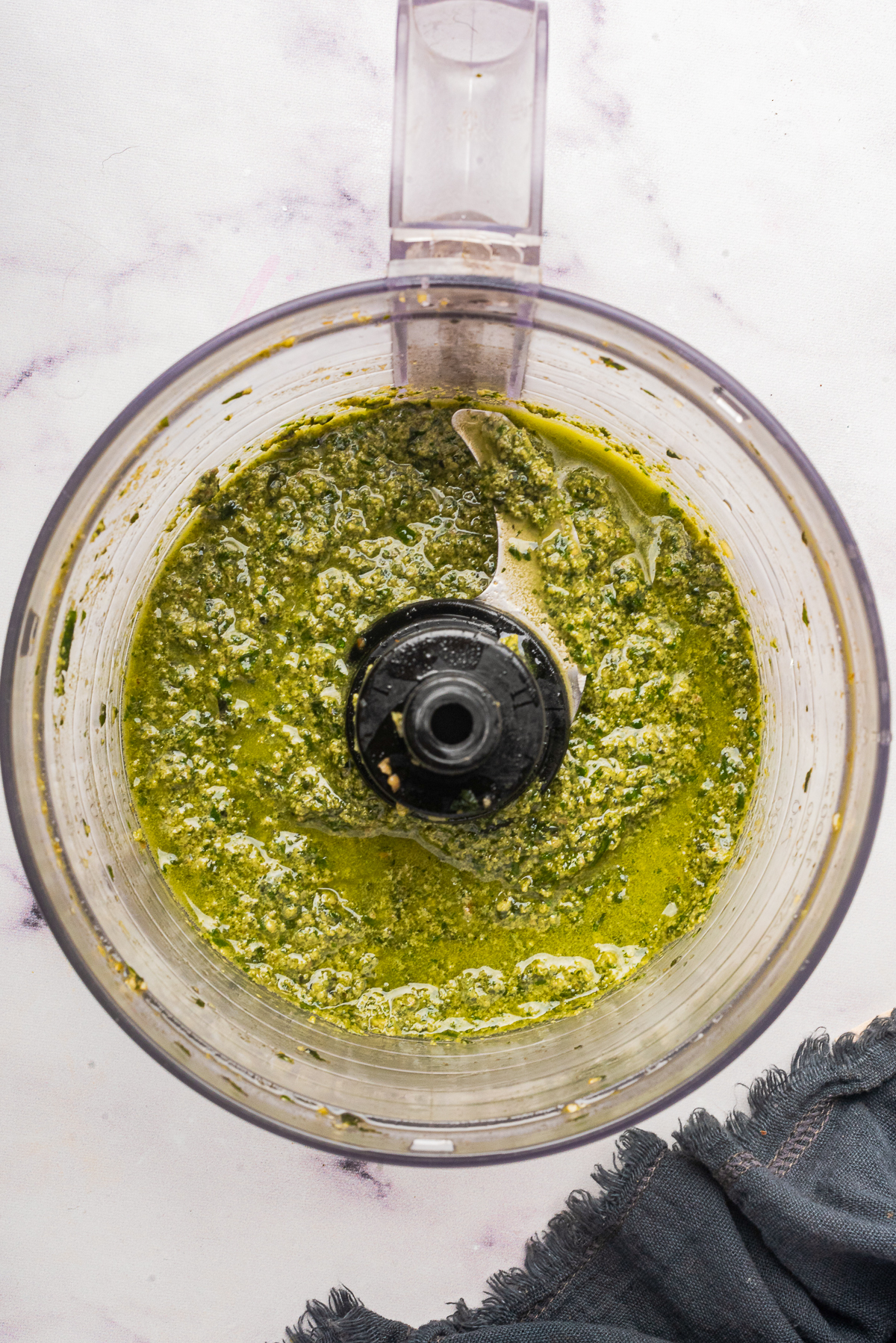 finished Pesto sauce with walnuts in food processor