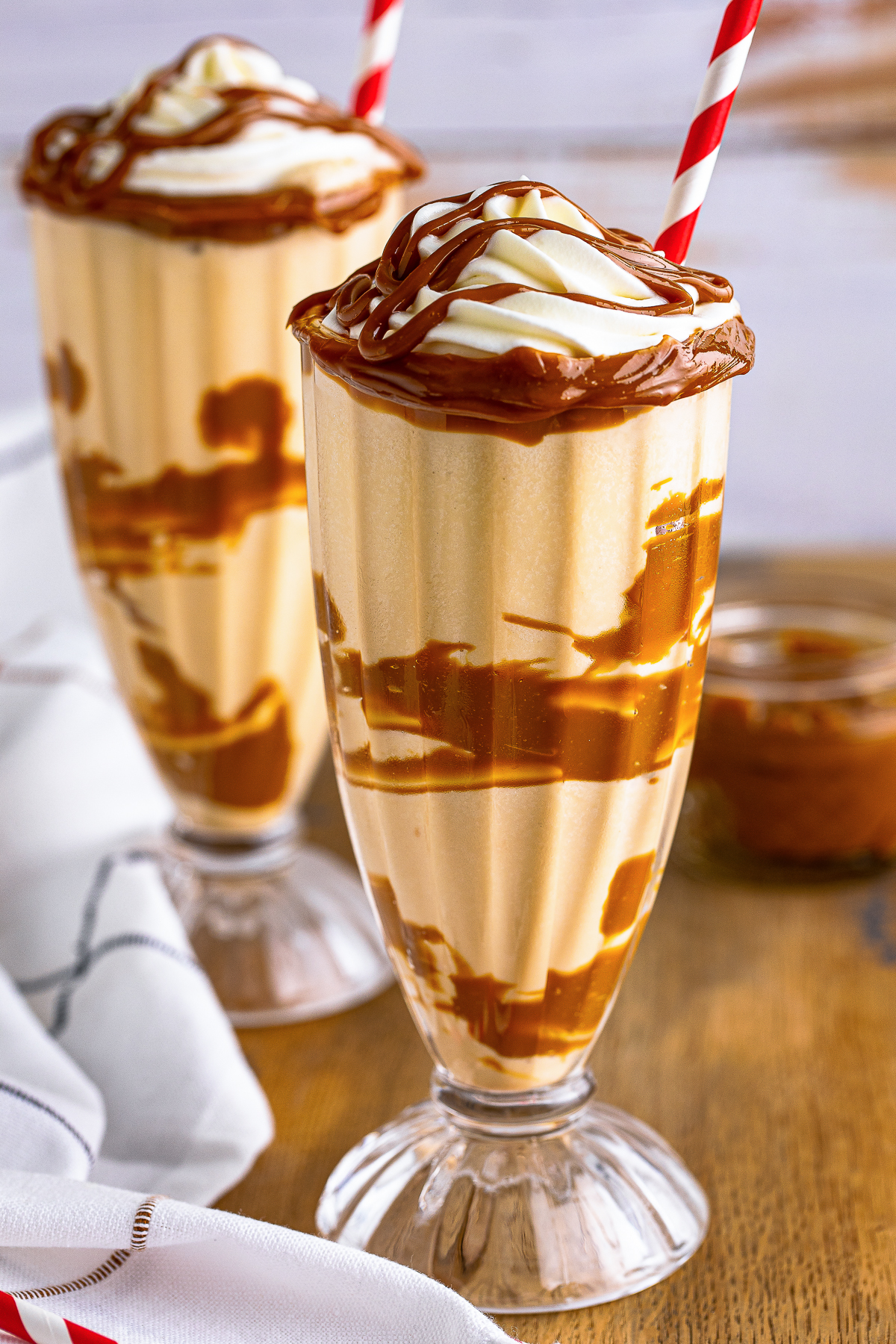 Dulce de Leche Milkshake served in glasses with garnish