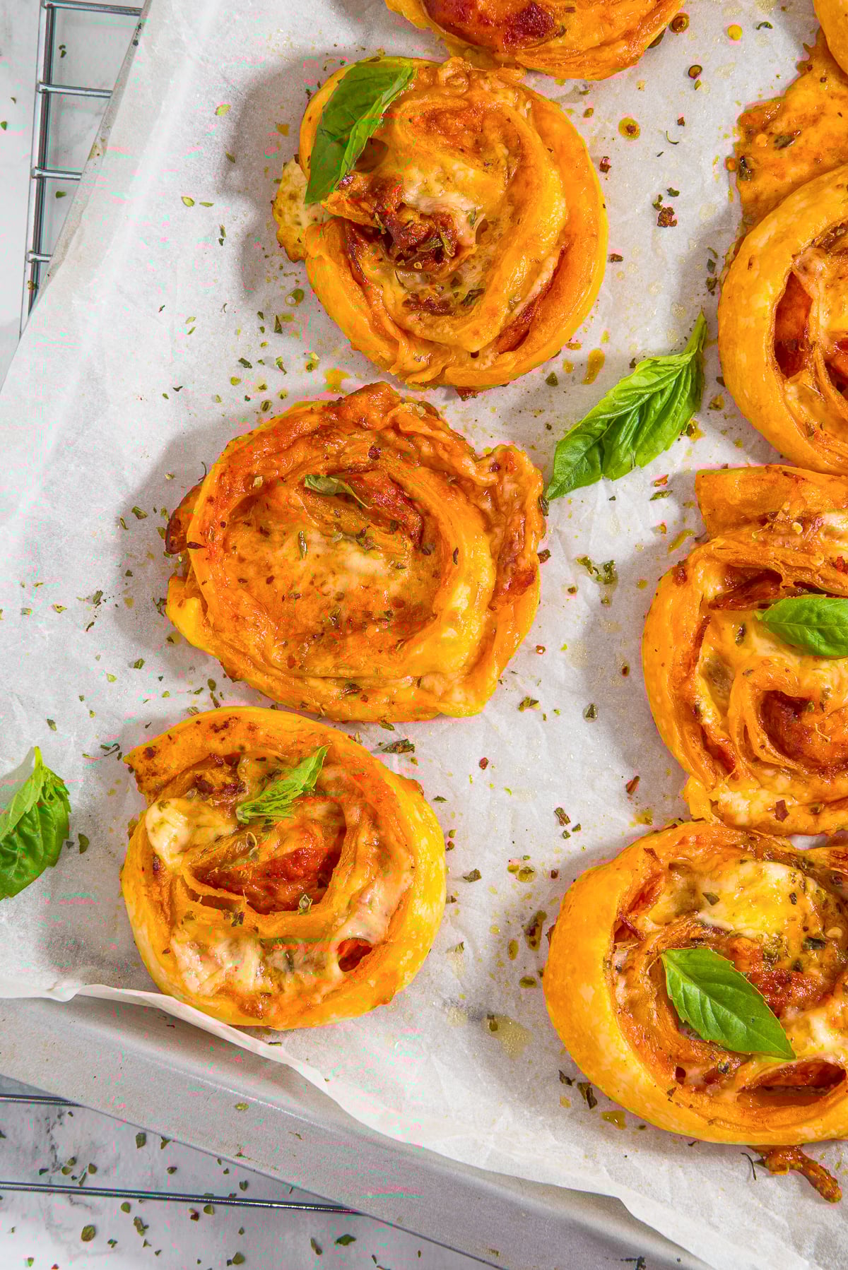 overhead image of Pepperoni Rolls on parchment