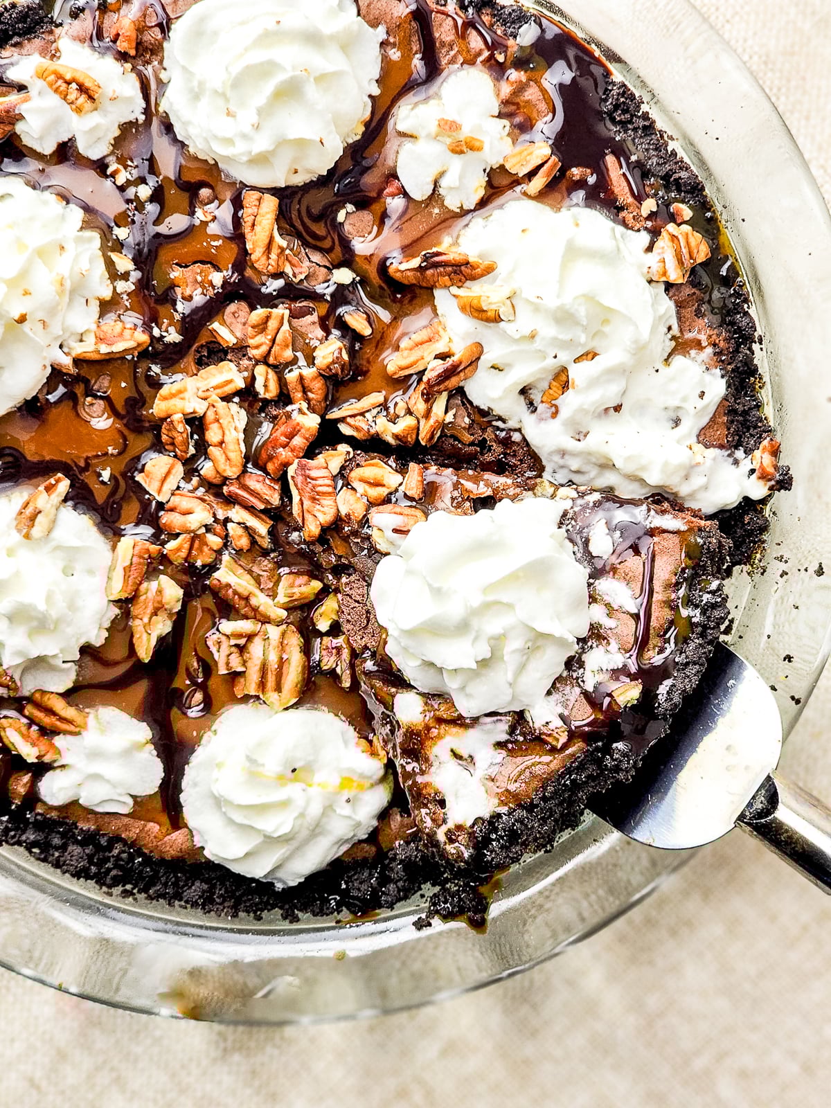 overhead image of Brownie Pie with a slice being taken out