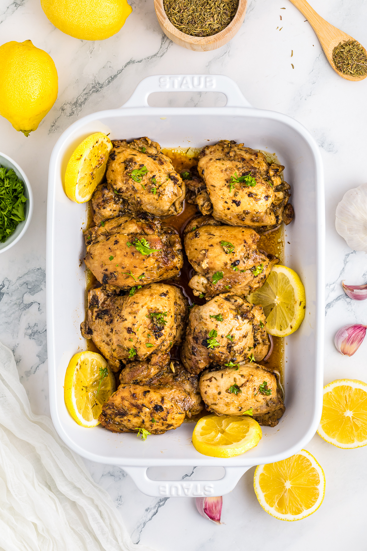 overhead image of Marinaded Chicken Thighs in a baking dish