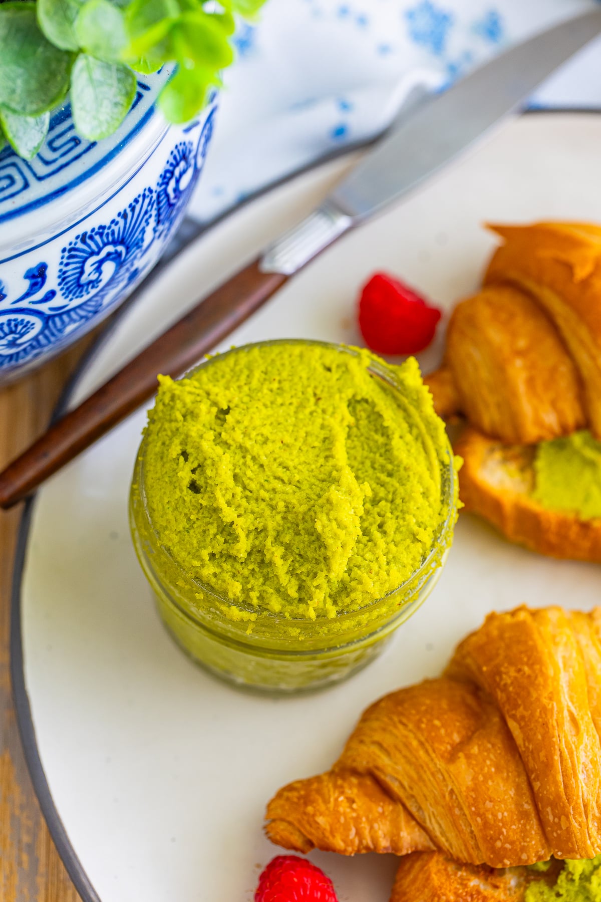 Pistachio Spread in a small glass jar overhead image