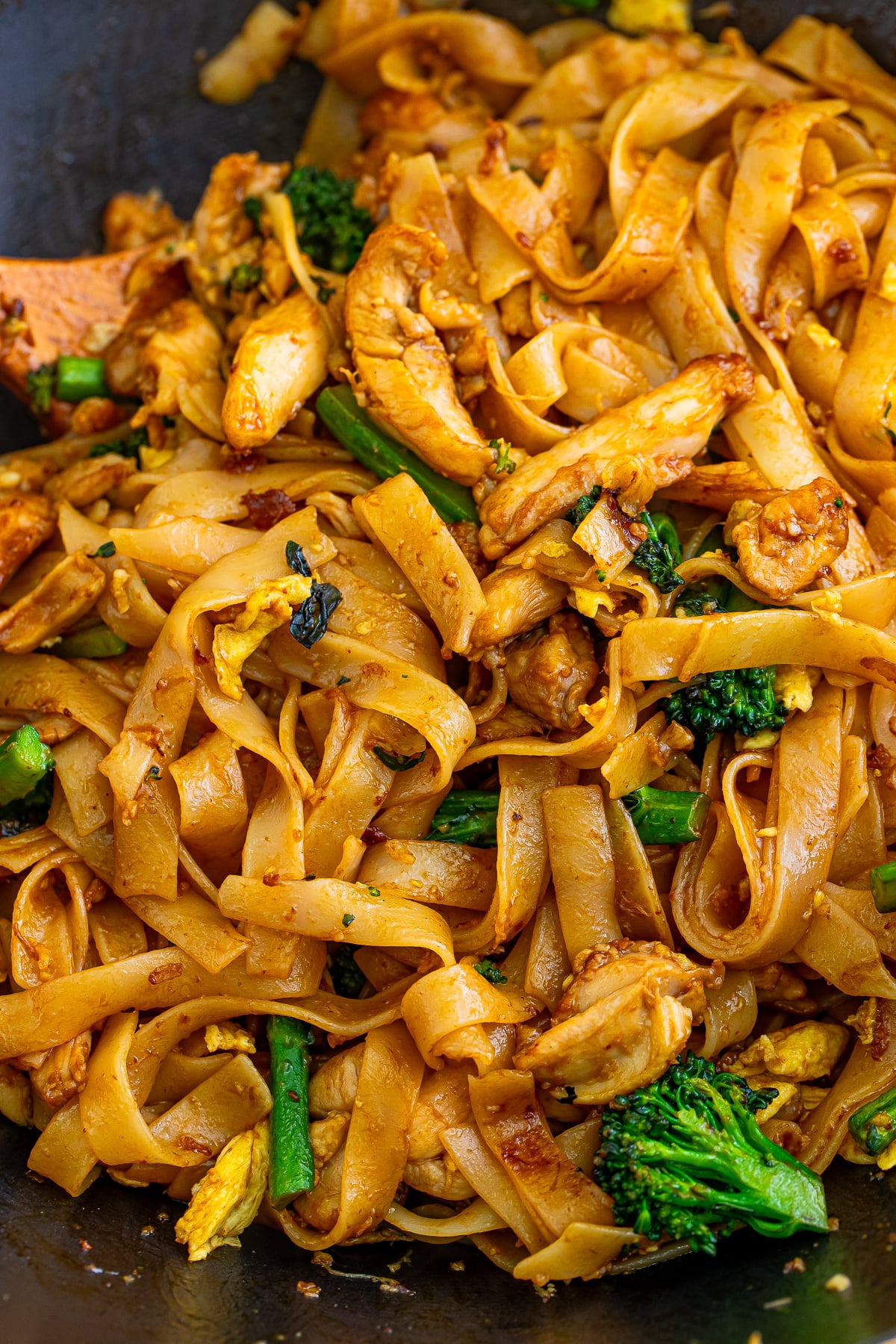 up close image of finished Thai Pad See Ew in wok