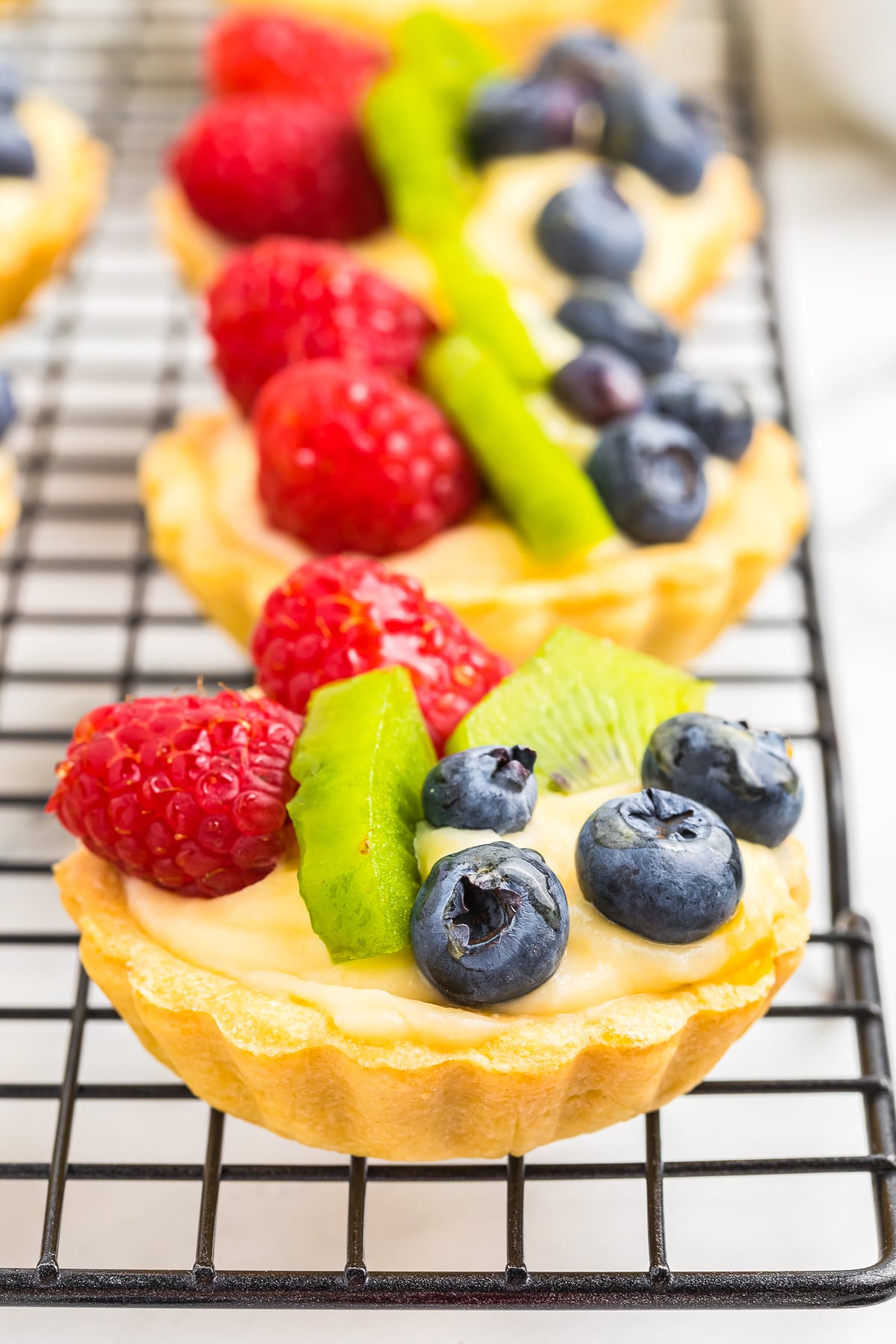 up close image of Fruit Tartlets on wire rack
