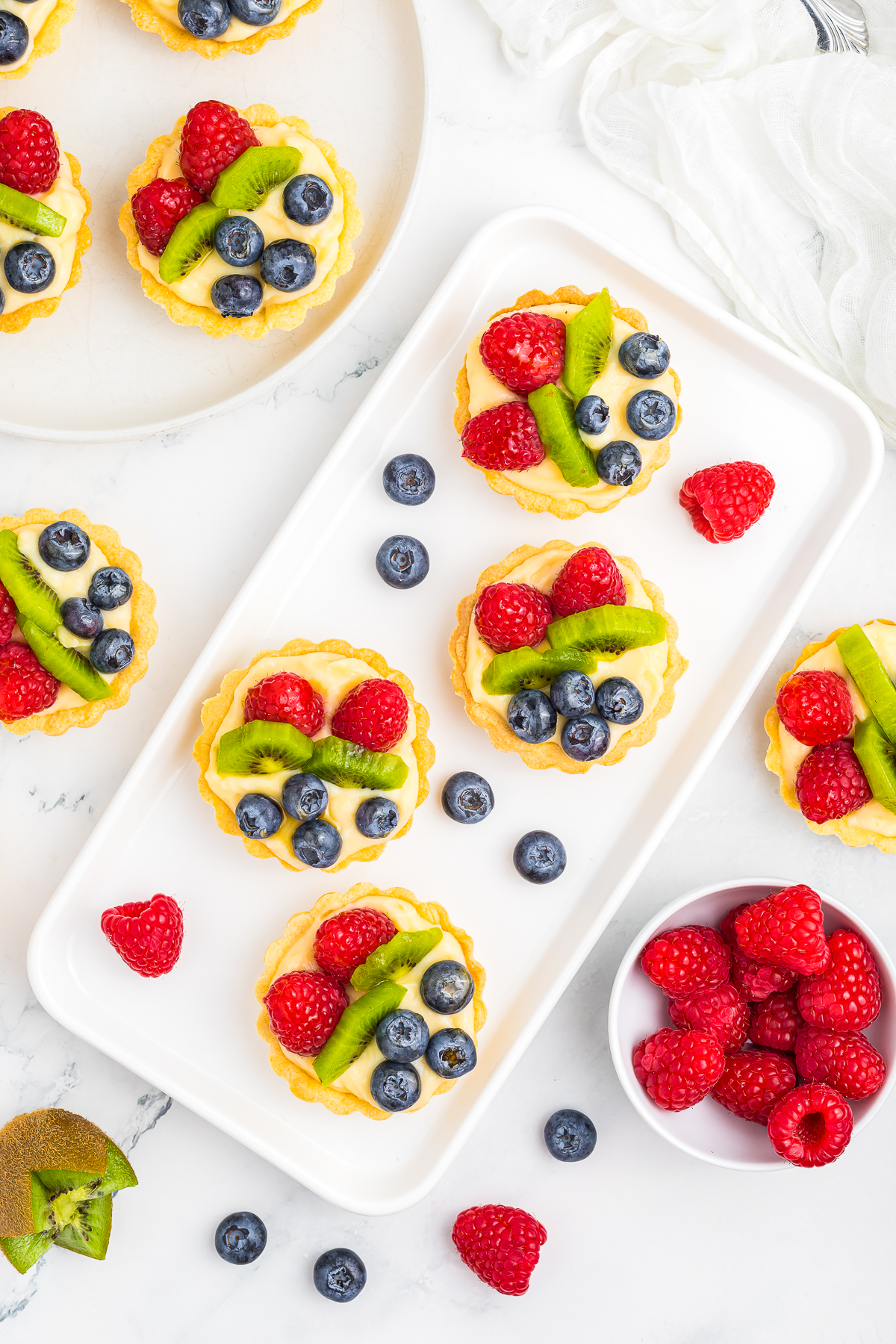 overhead image of Fruit Tartlets on rectangle plate