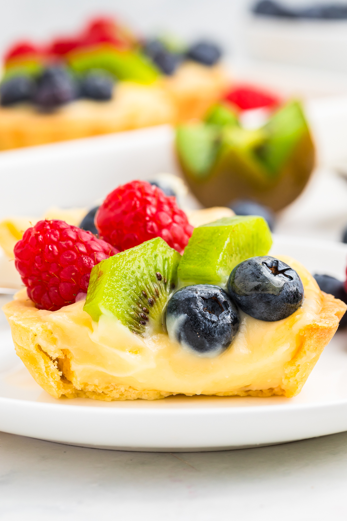 up close image of Fruit Tartlets cut in half to show interior