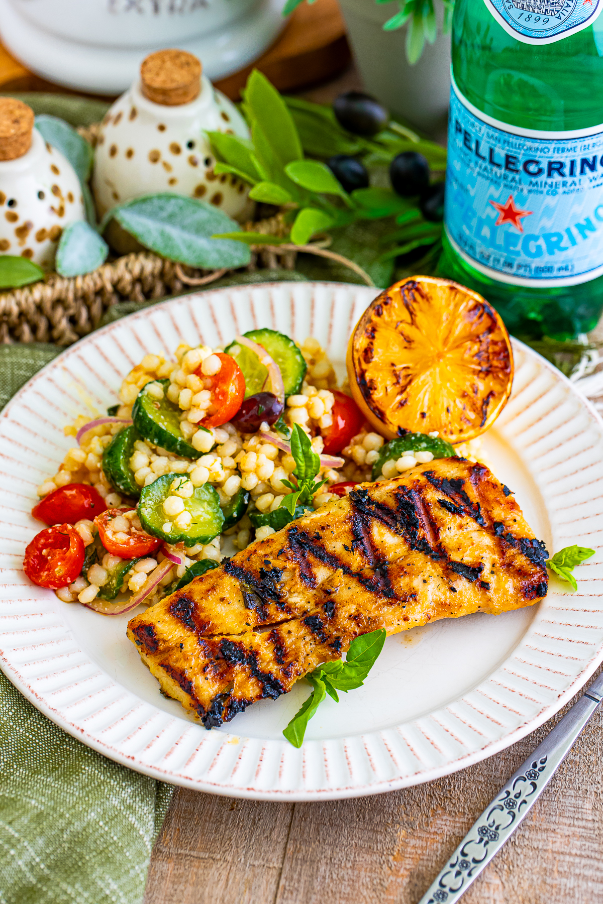 farther away image of Grilled Mahi served with sides