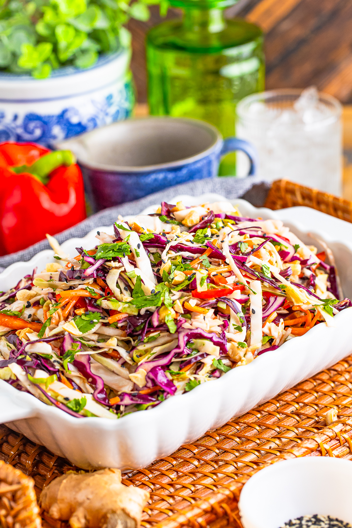 Asian Slaw Recipe served in a white bowl on a tray
