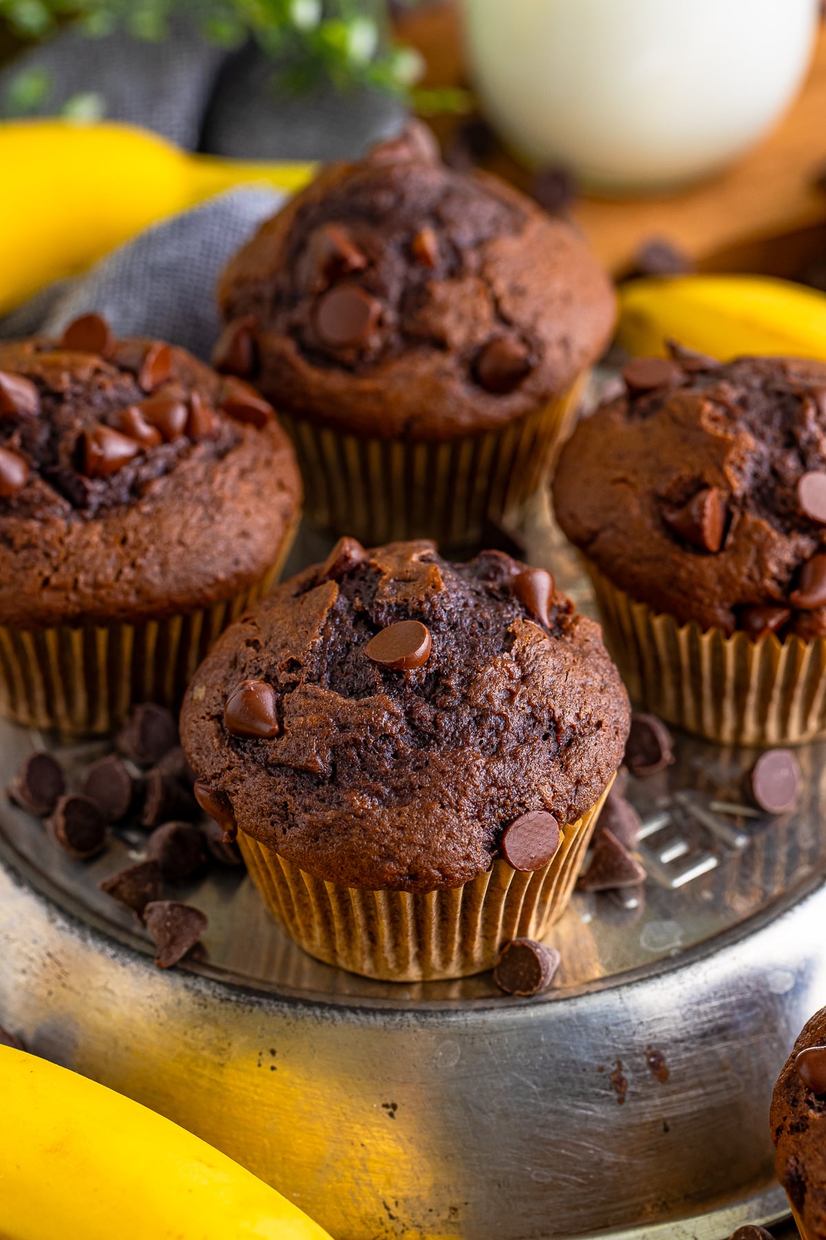 closer image of Chocolate Banana Chocolate Chip Muffins served on tray