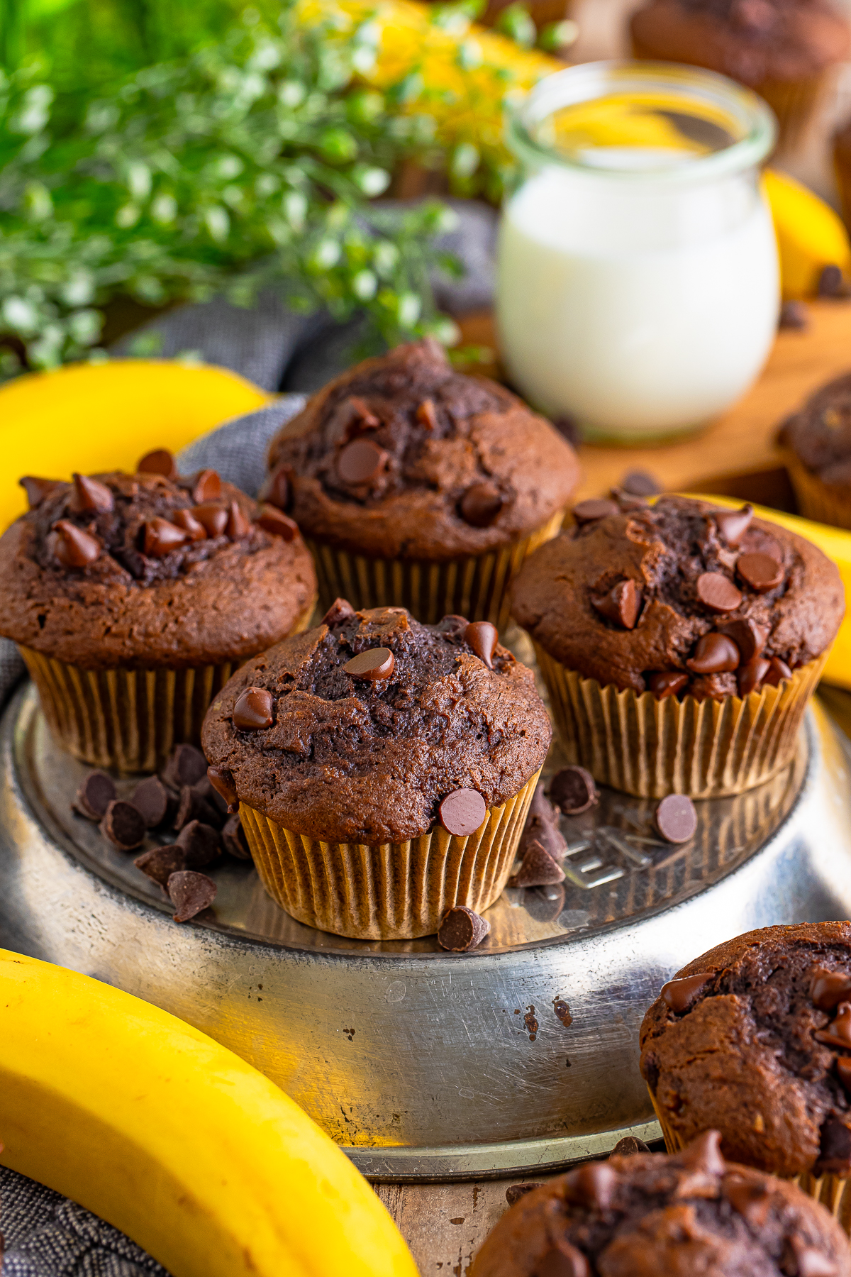 Chocolate Banana Chocolate Chip Muffins served on a metal tray