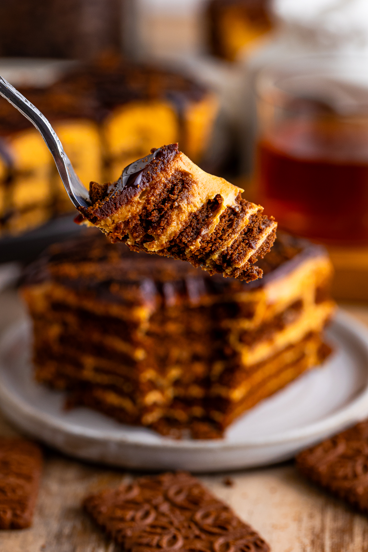 a fork holding up a bite of Chocotorta in air