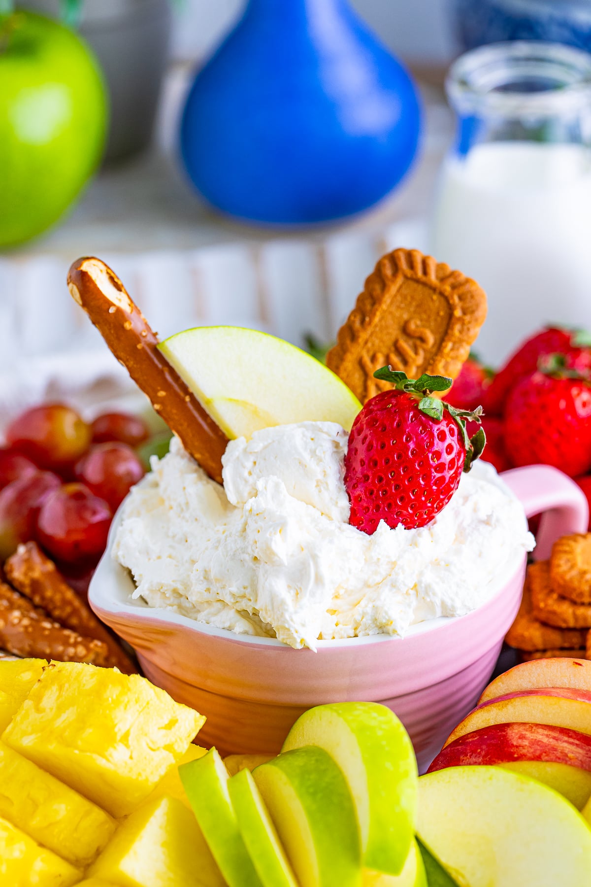 Cream Cheese Fruit Dip in a bowl with dippers in it