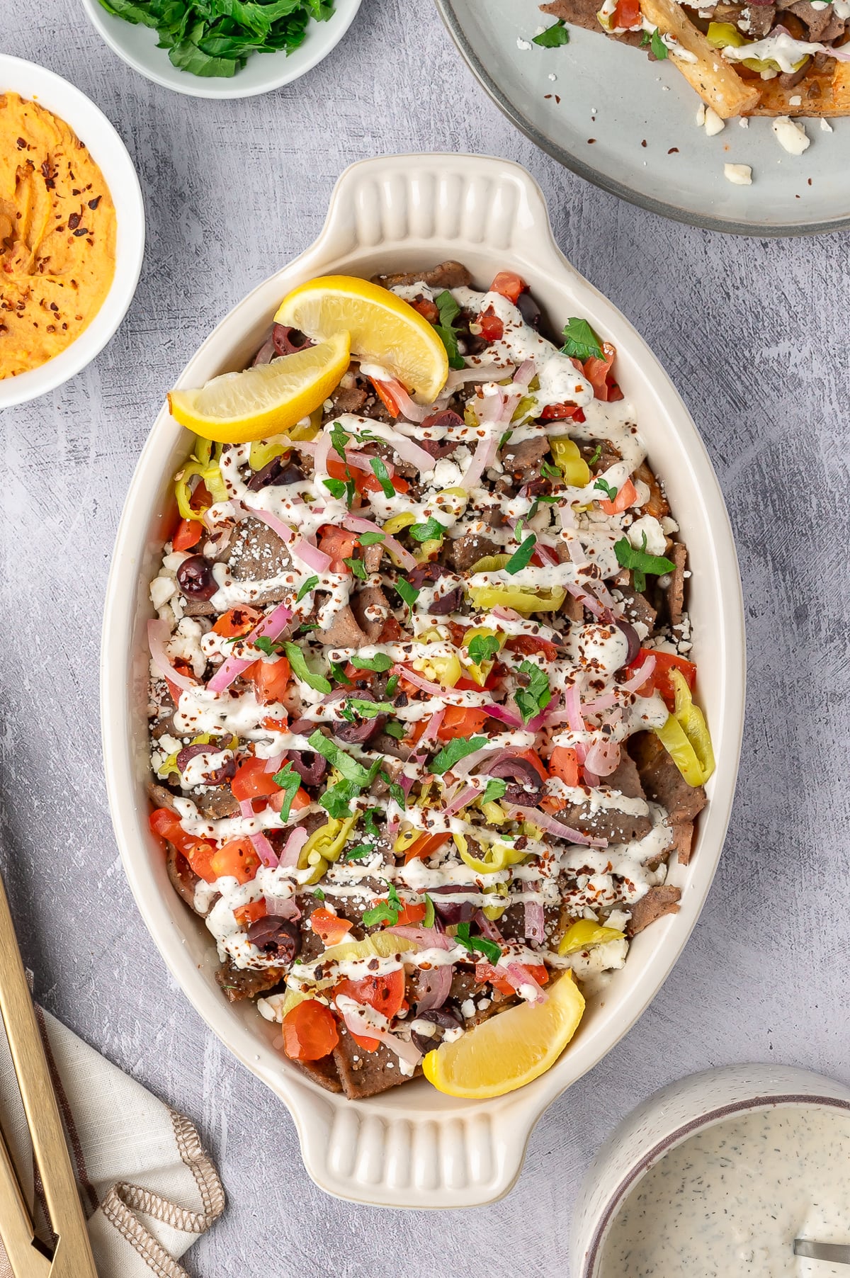 overhead image of Greek Fries in a white serving dish