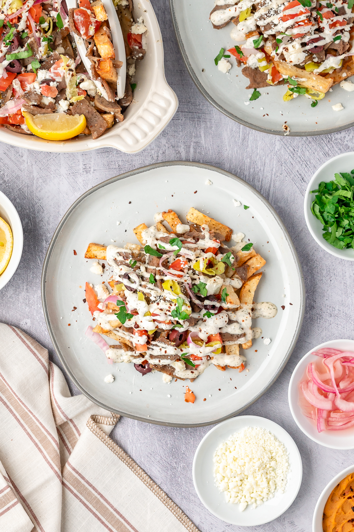 overhead image of Greek Fries on a white plate