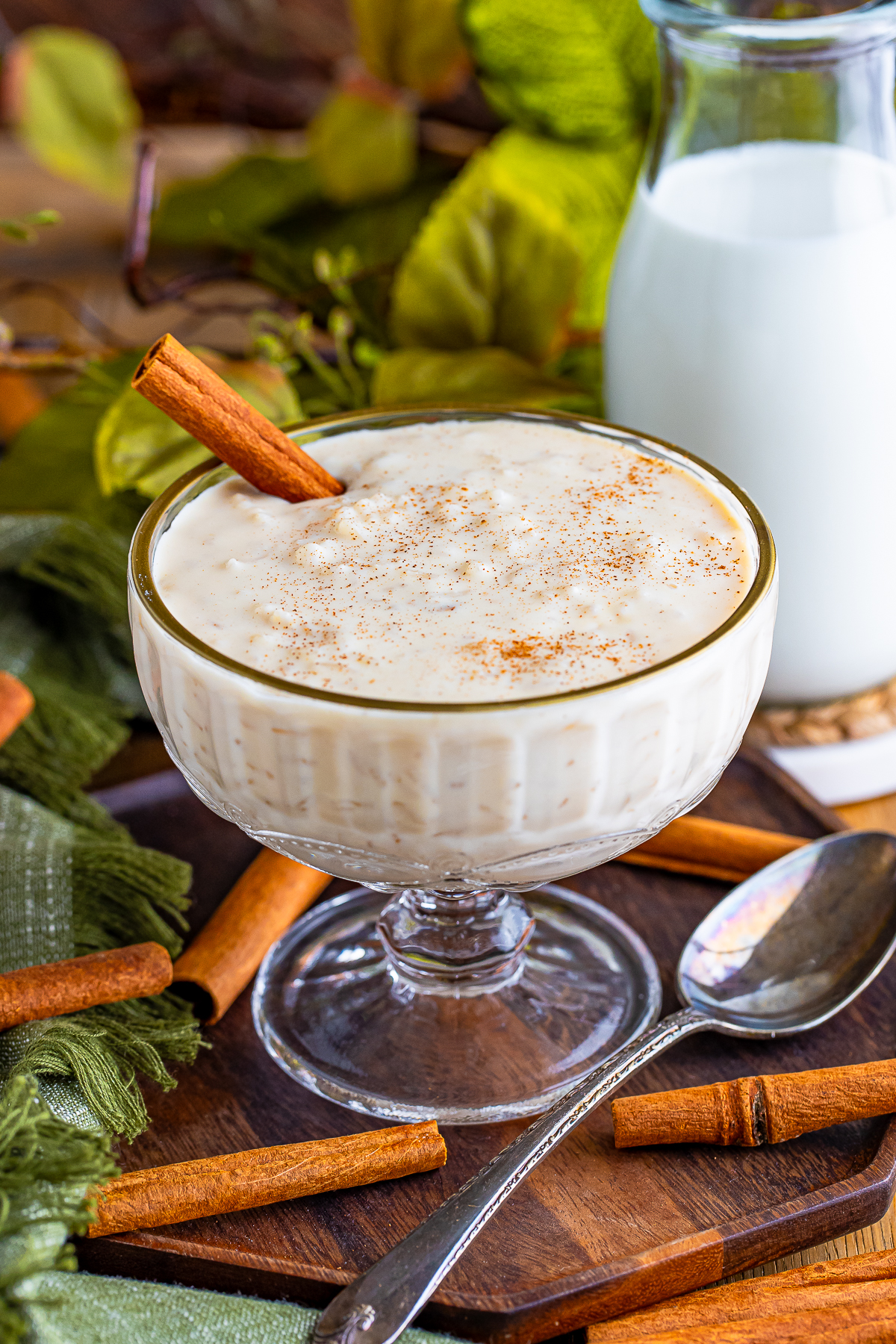 Mexican Rice Pudding served in a fancy bowl with cinnamon sticks