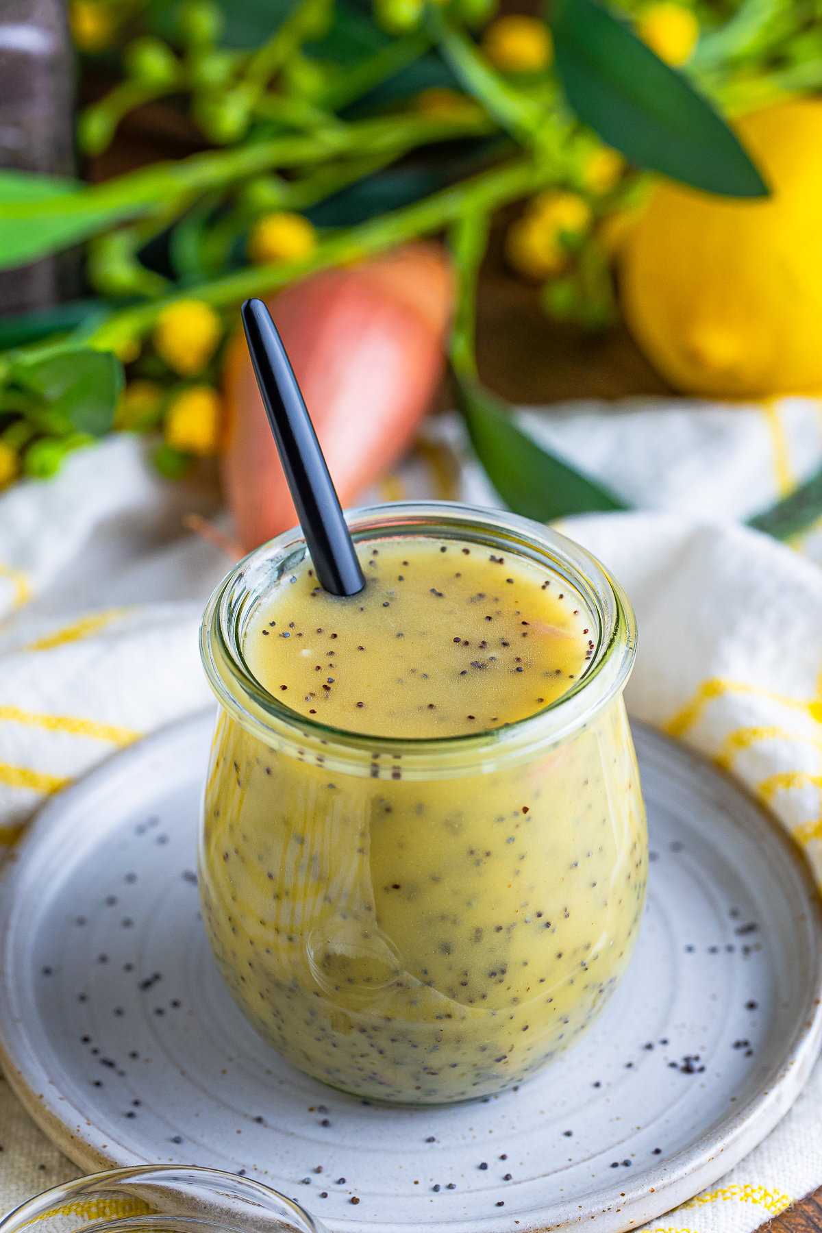 a spoon in a jar of Poppy Seed Dressing
