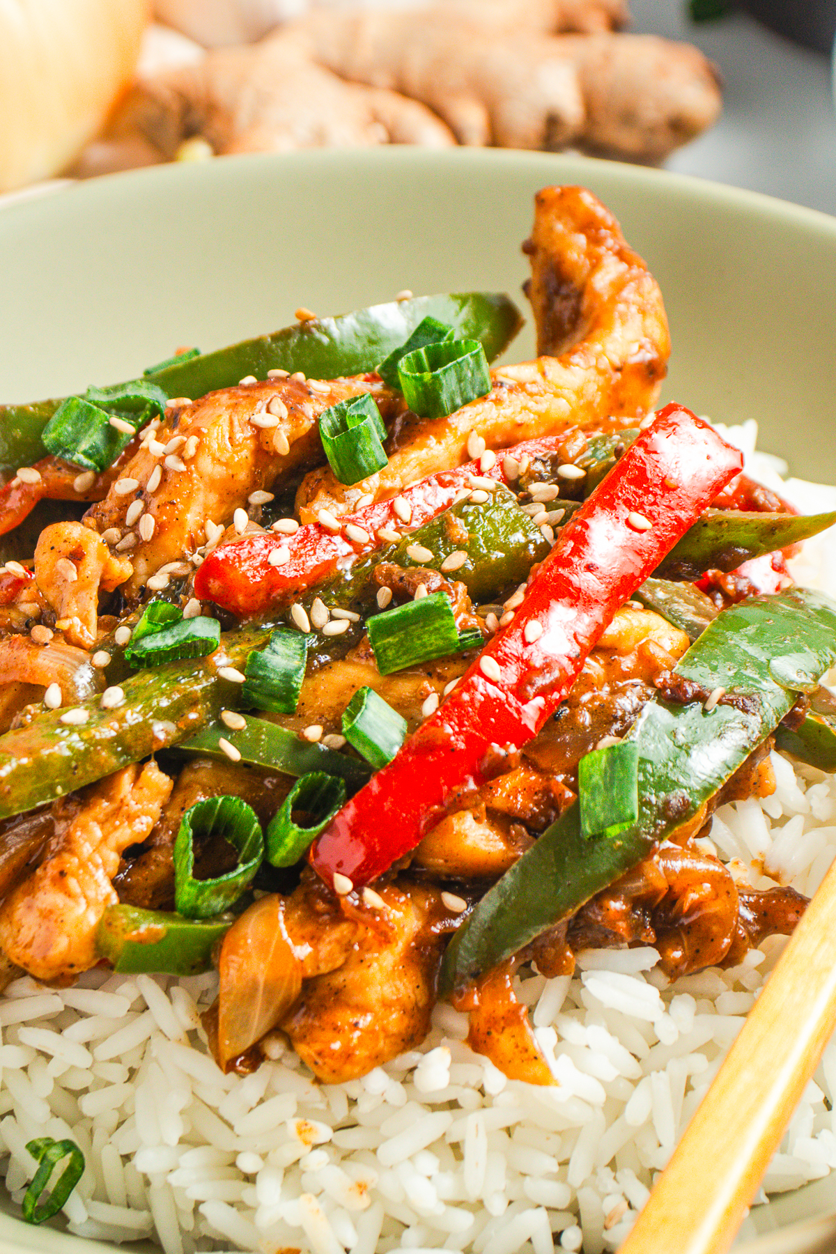 up close image of Black Pepper Chicken over rice