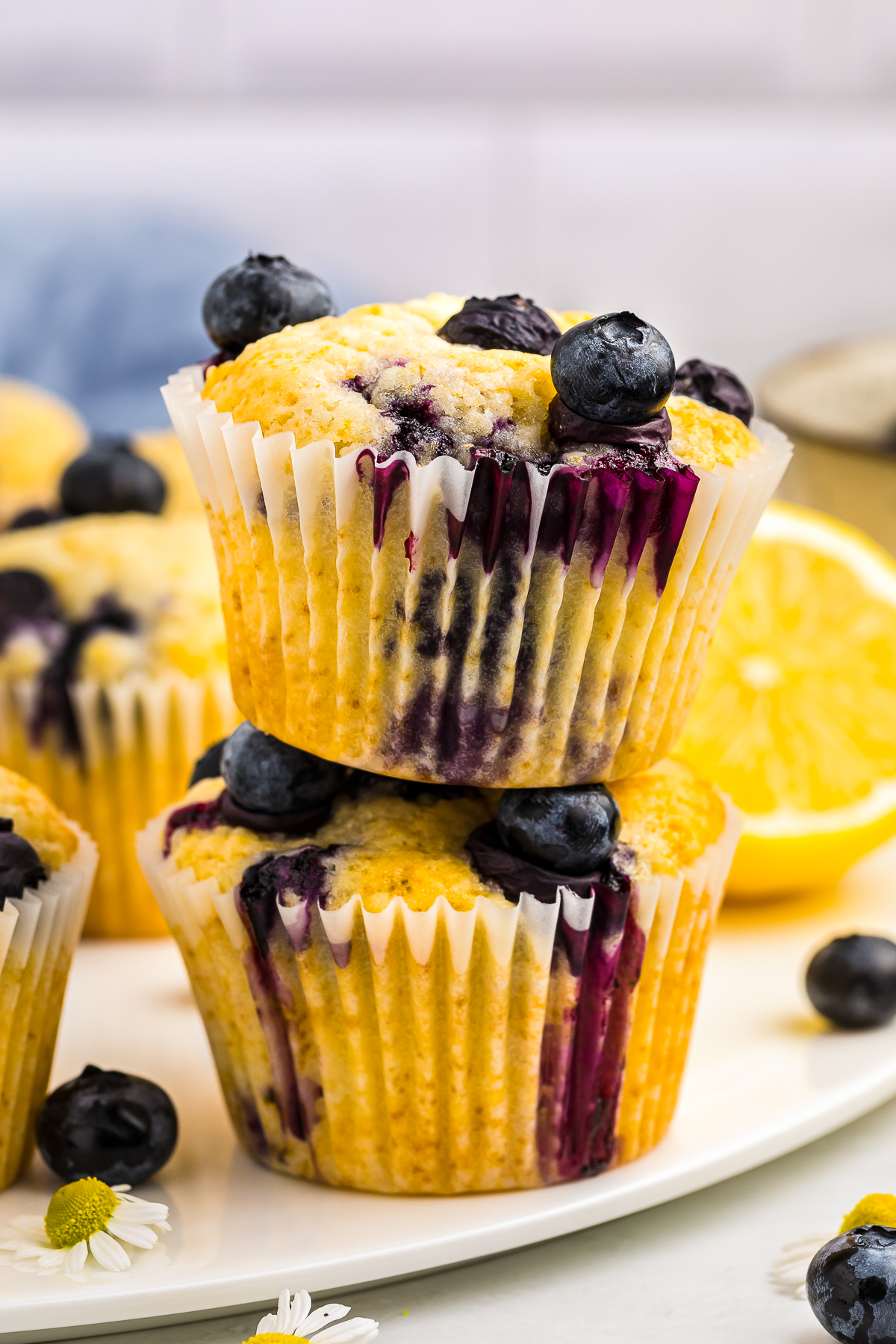 two Lemon Blueberry Muffins stacked on top of each other