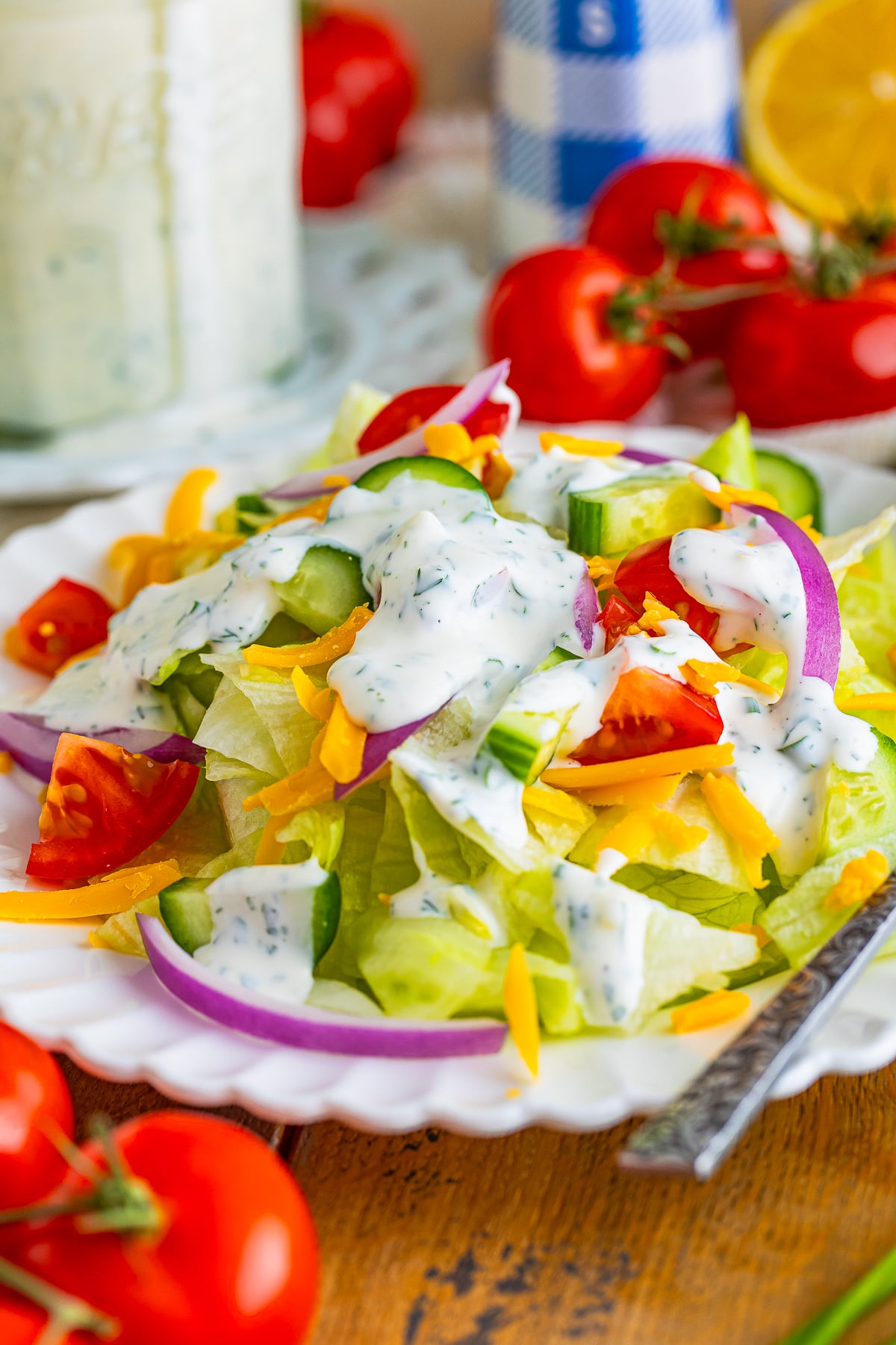 a salad with Buttermilk Ranch Salad Dressing drizzled on top